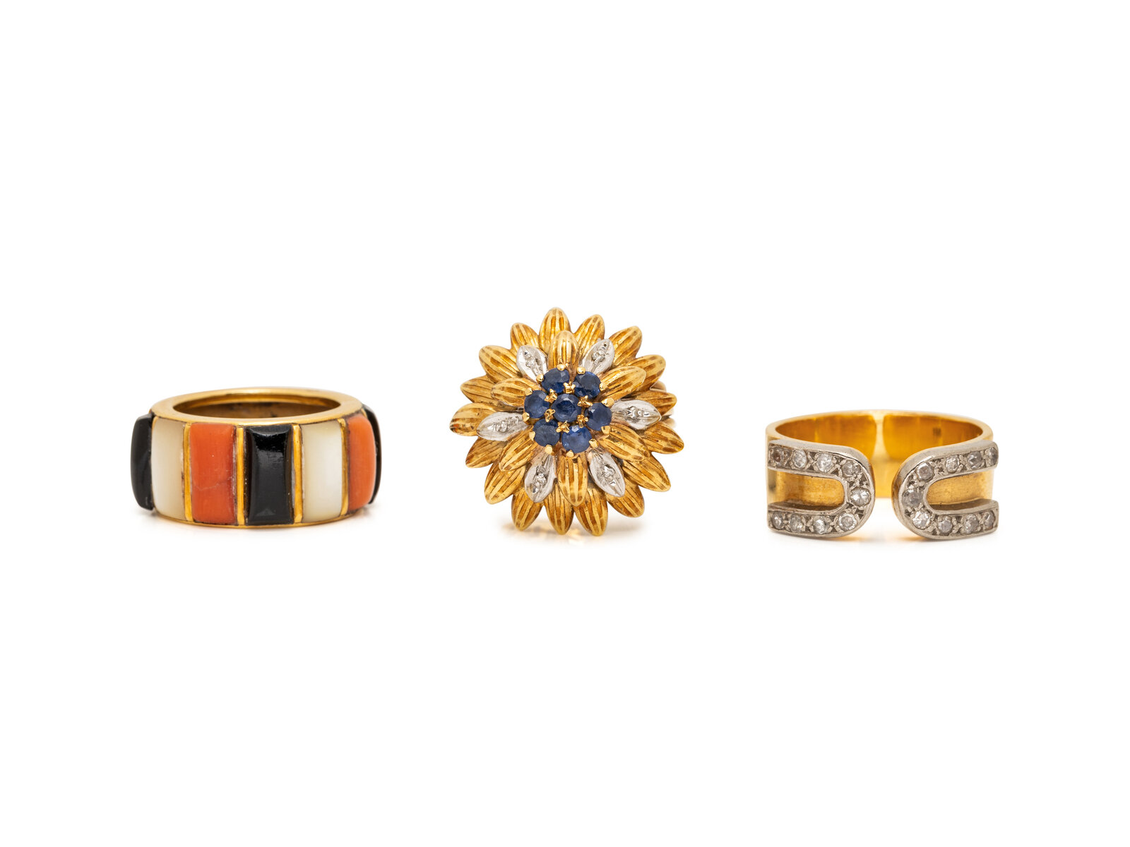 Appraisal: COLLECTION OF MULTIGEM RINGS Consisting of a Cartier ring set