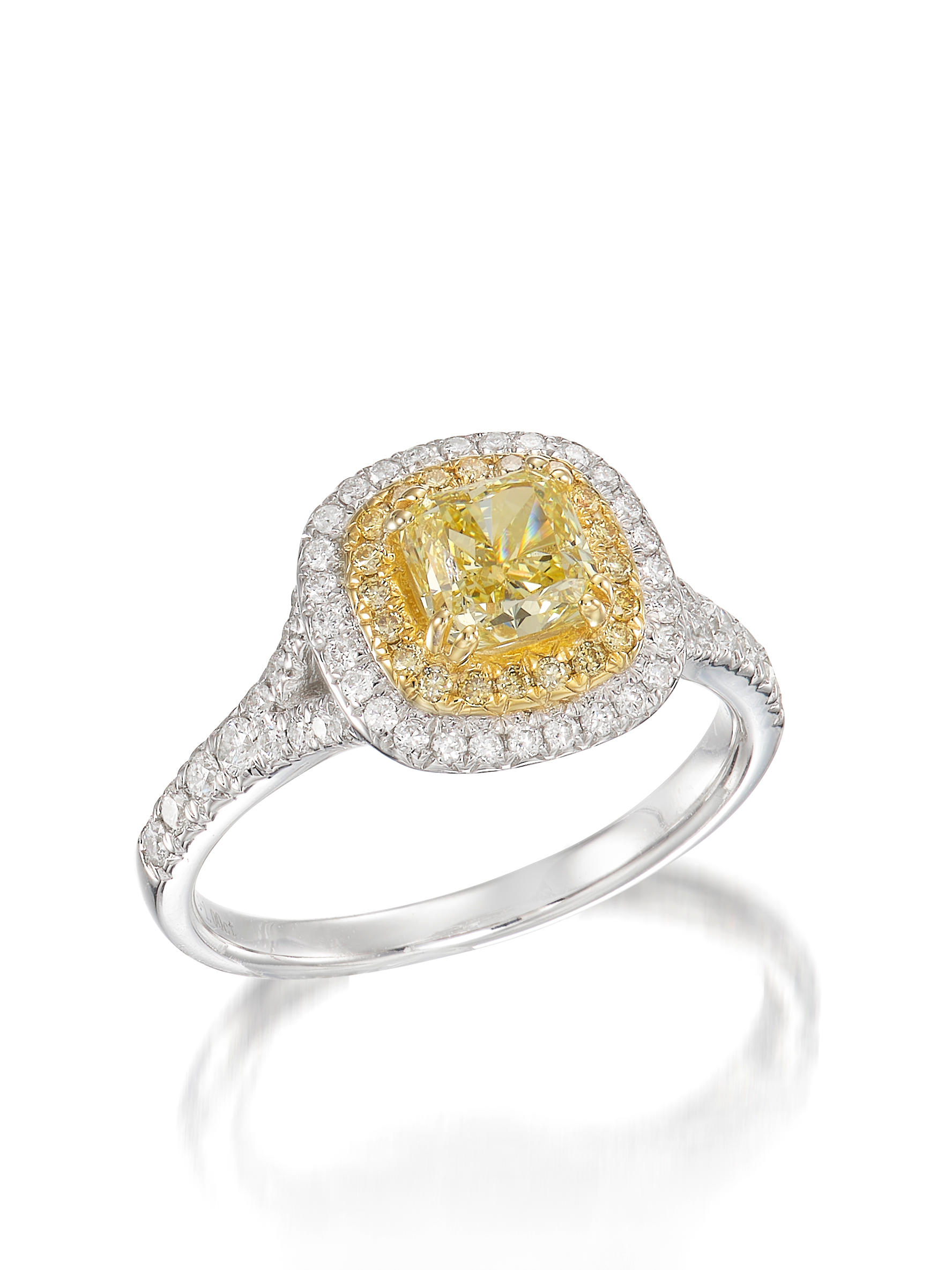 Appraisal: FANCY YELLOW DIAMOND AND DIAMOND RING Set with a cut-cornered