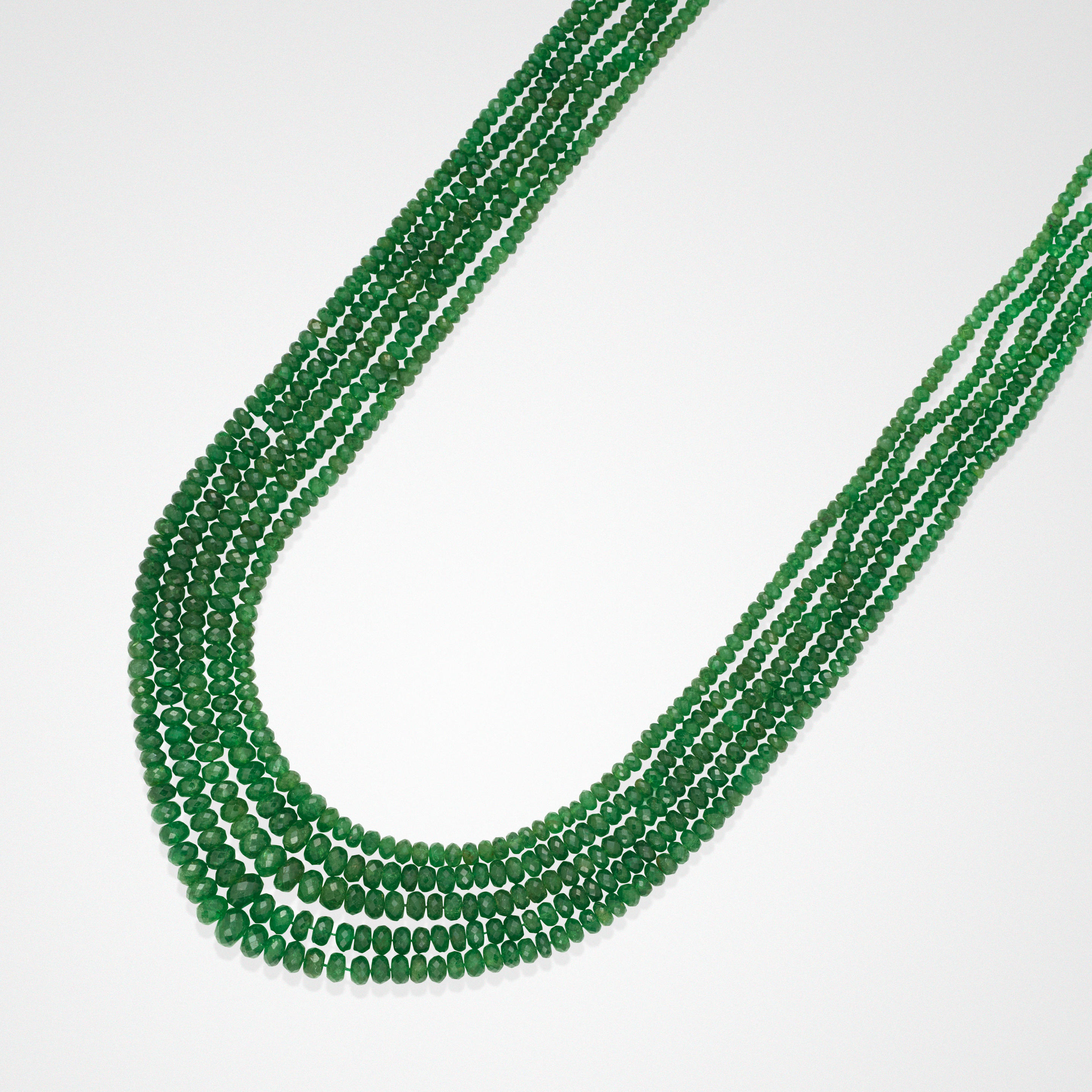 Appraisal: TSAVORITE GARNET BEAD NECKLACE Kenya A five-strand necklace comprised of