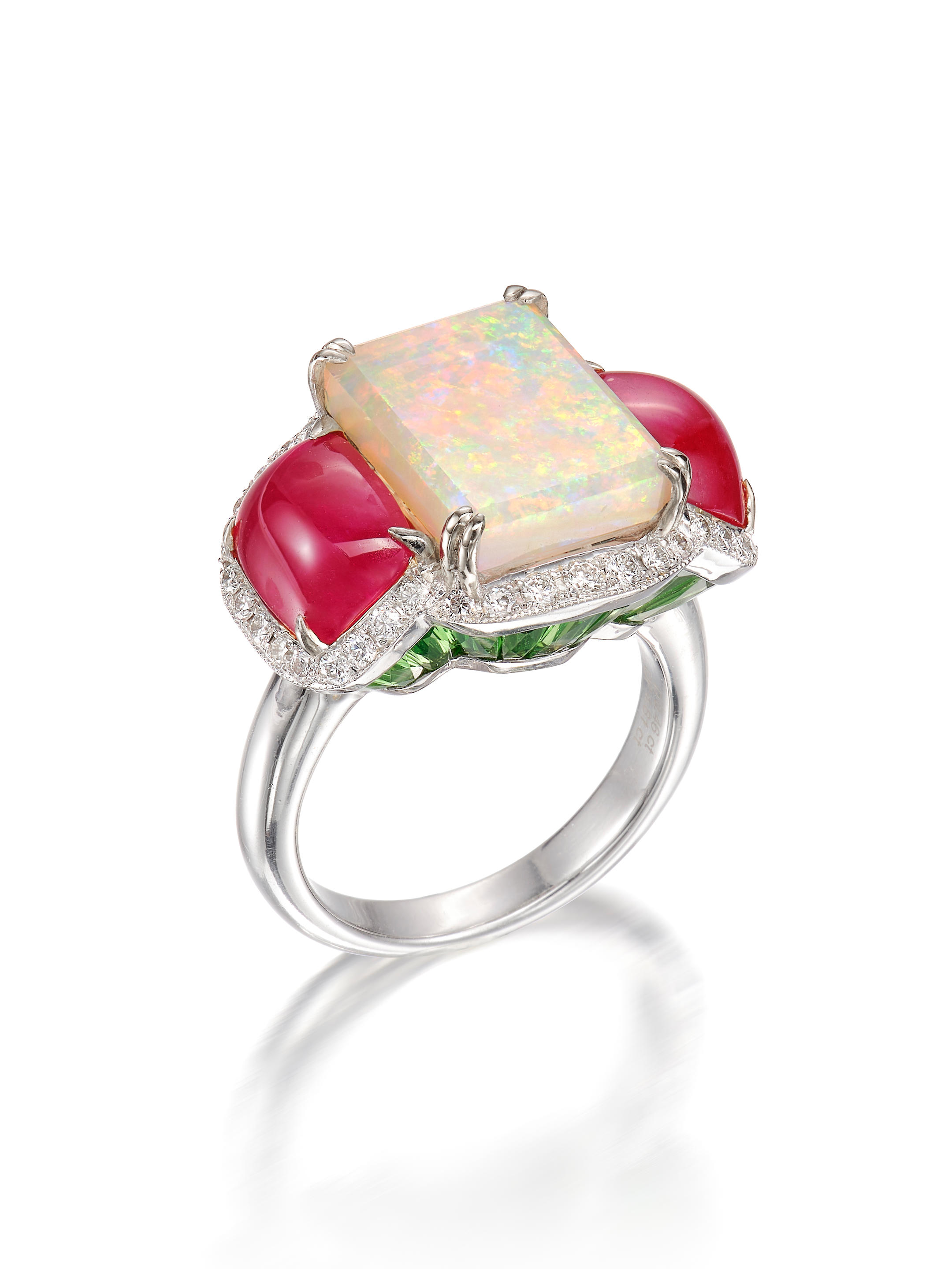 Appraisal: OPAL GEM-SET AND DIAMOND RING Set with a rectangular opal