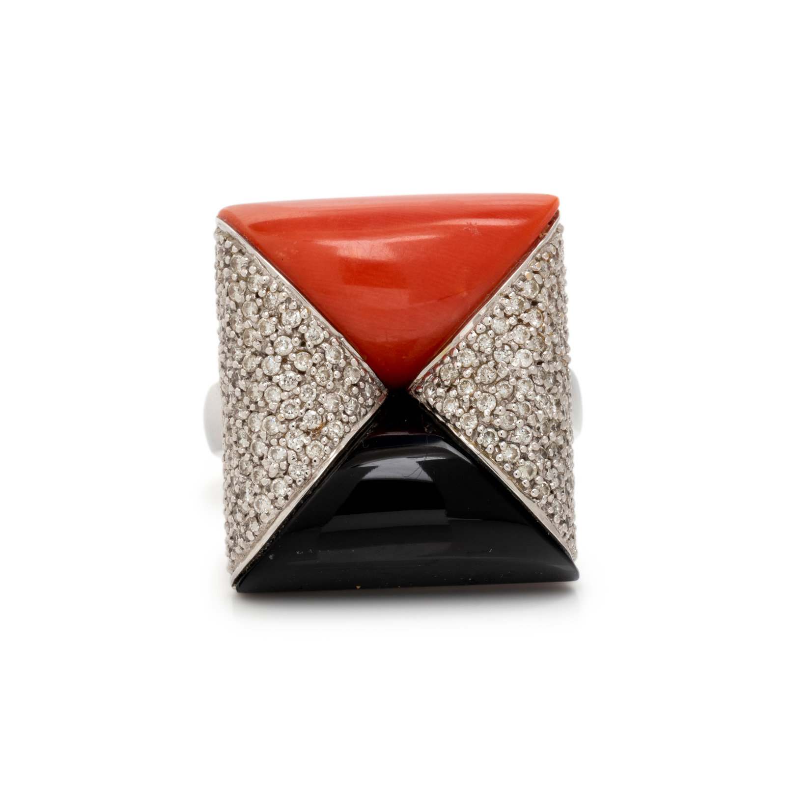 Appraisal: DIAMOND CORAL AND ONYX RING Round brilliant cut diamonds carved