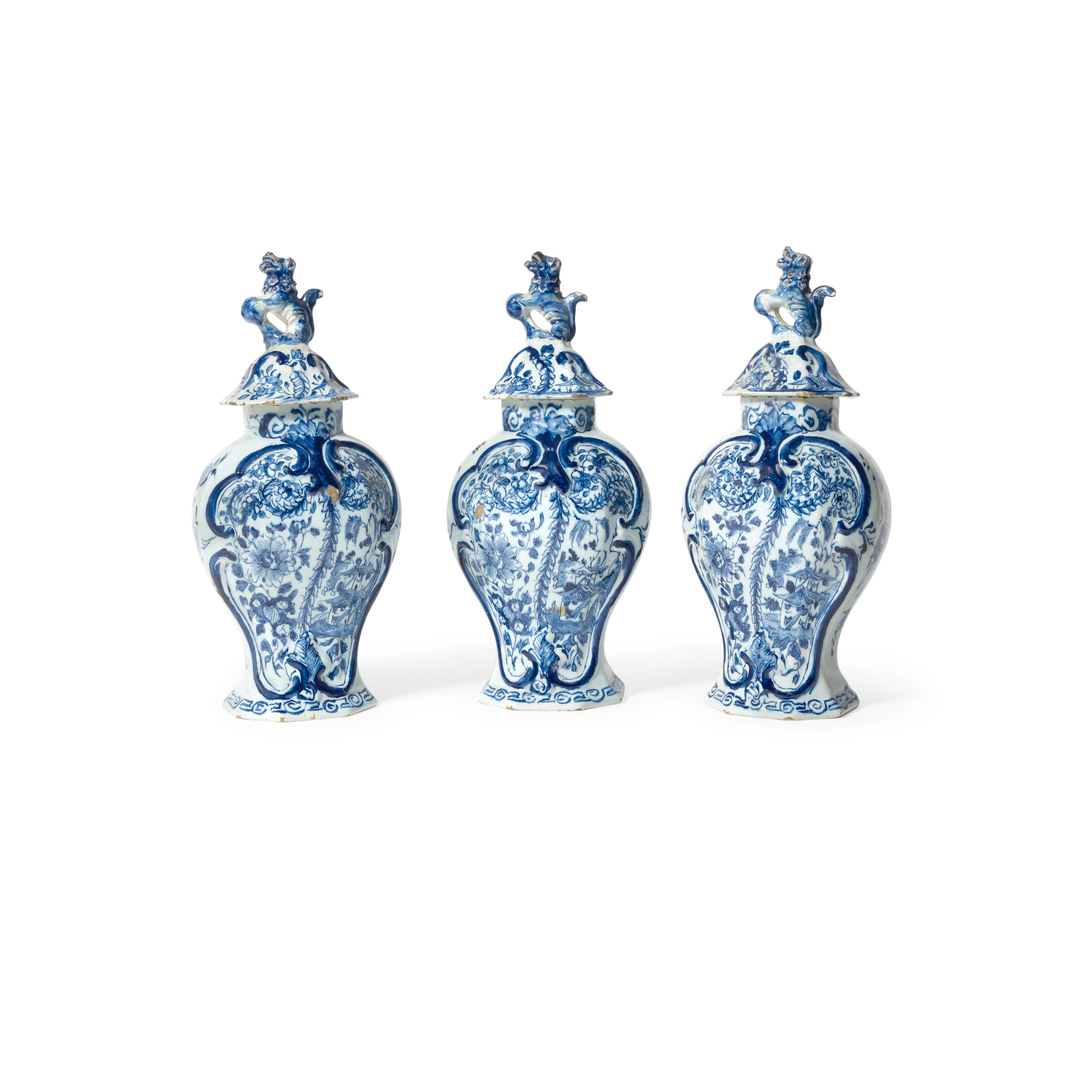 Appraisal: A SET OF THREE DELFT BLUE AND WHITE COVERED JARS