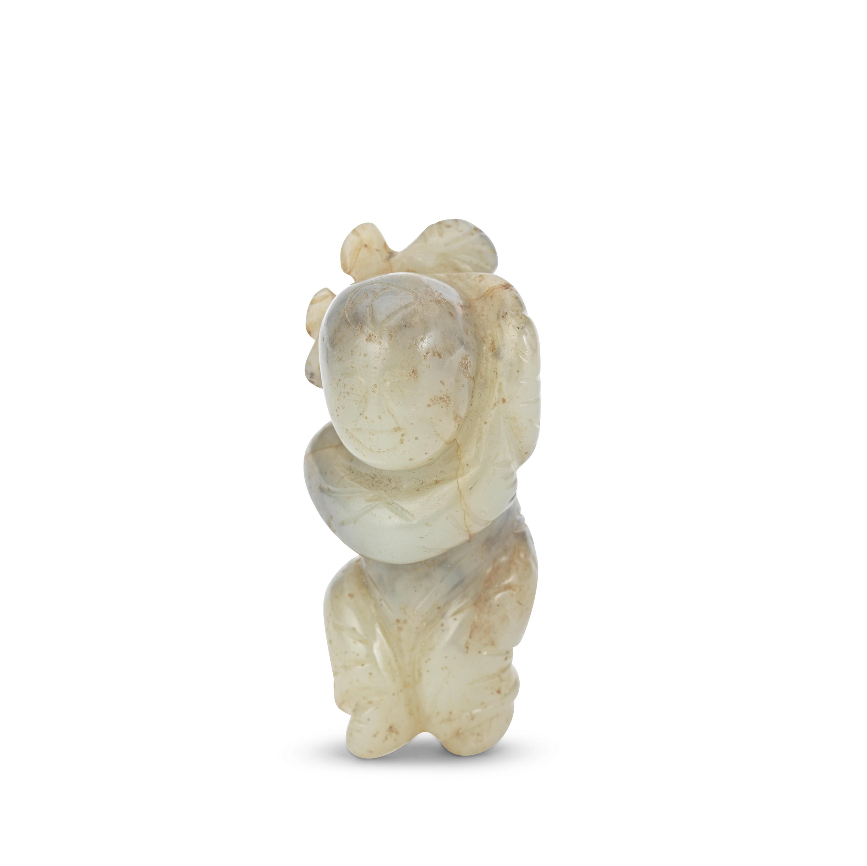 Appraisal: A MOTTLED JADE CARVING OF A BOY Ming Dynasty The