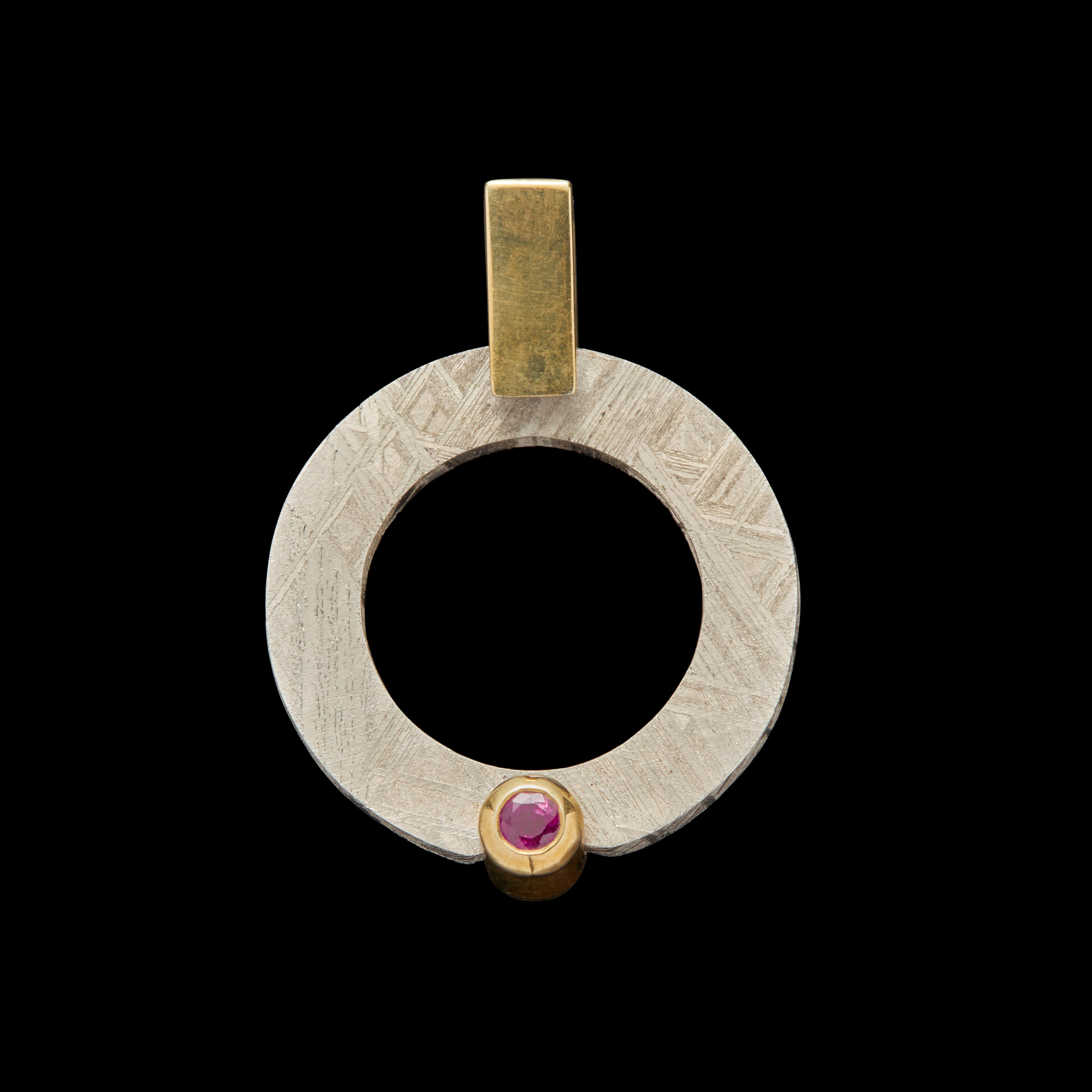 Appraisal: MUONIONALUSTA METEORITE AND RUBY PENDANT BY KONSTANTIN LIBMAN Iron-Nickel Fine