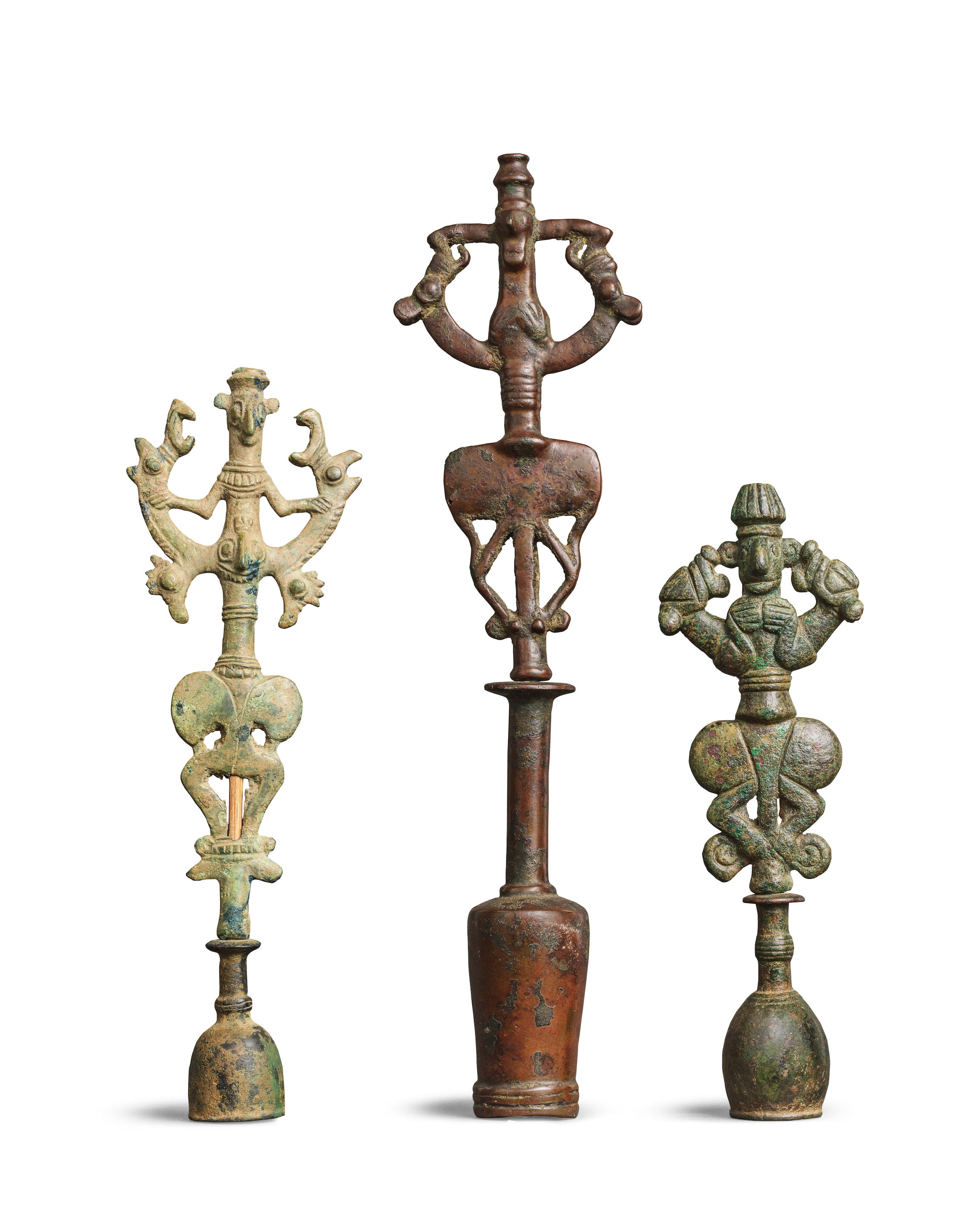 Appraisal: TWO LURISTAN BRONZE MASTER OF ANIMALS FINIALS AND A LURISTAN