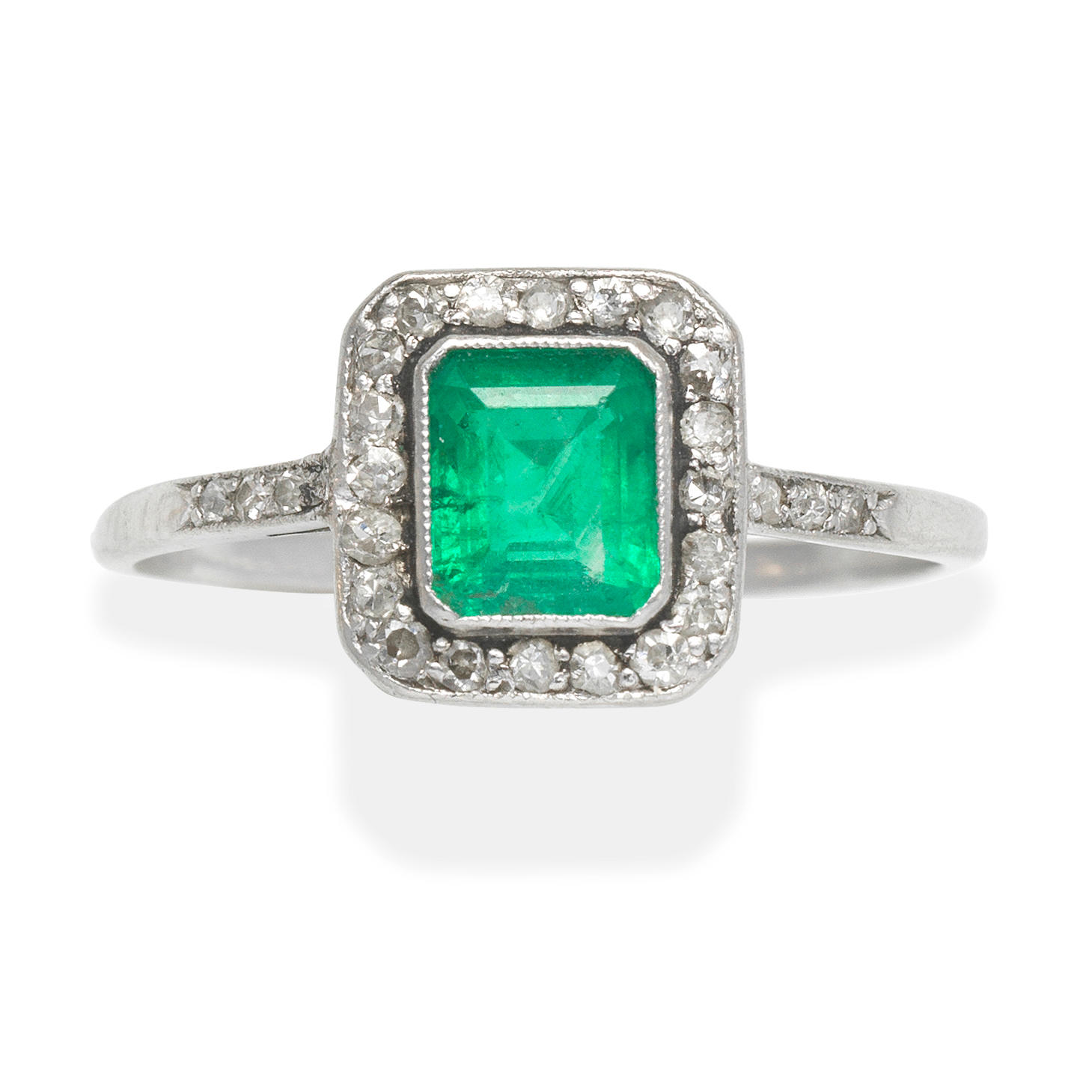 Appraisal: EMERALD AND DIAMOND RING Step-cut emerald very approx ct Single-cut