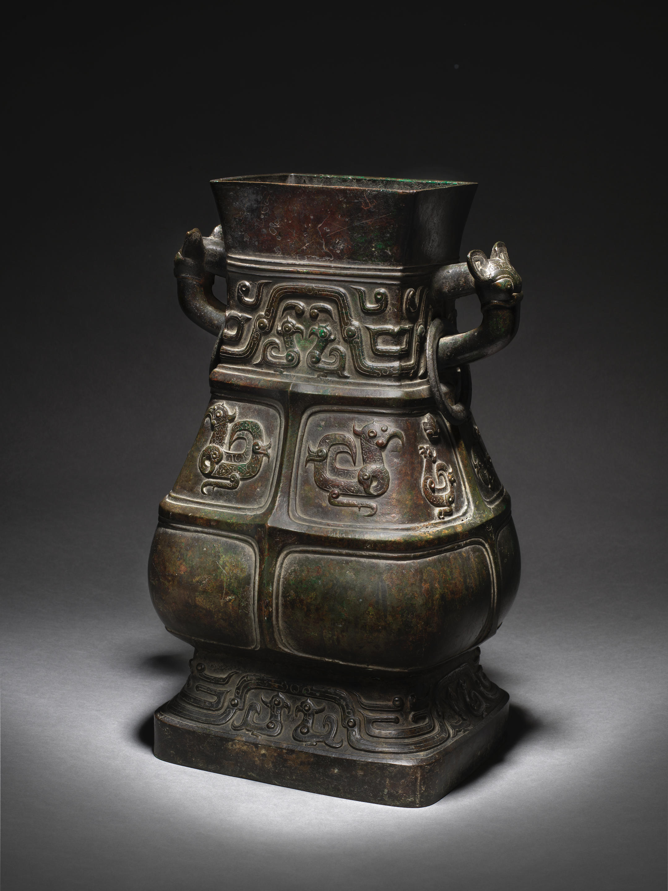 Appraisal: AN IMPORTANT AND RARE MONUMENTAL ARCHAISTIC BRONZE RITUAL WINE VESSEL