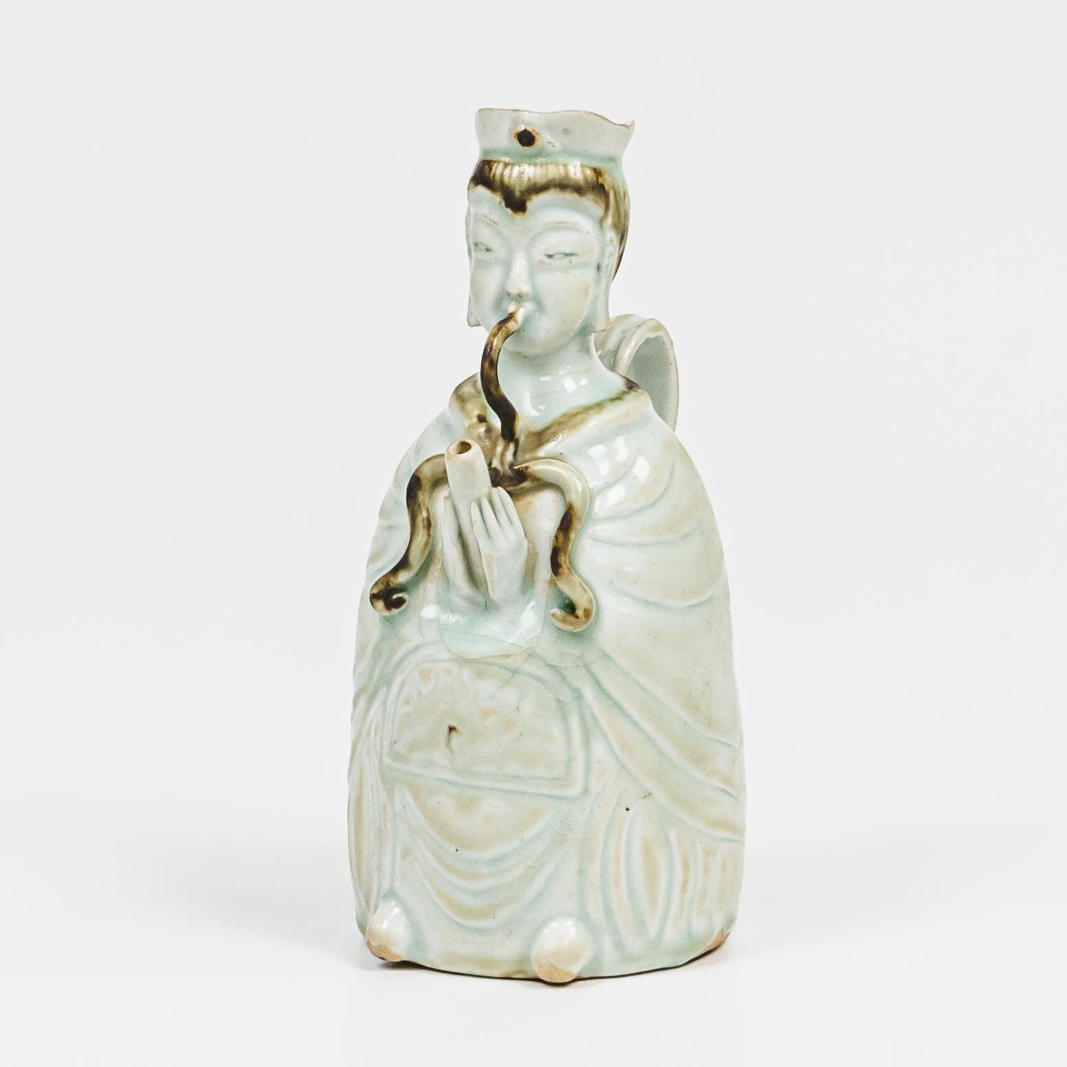 Appraisal: QINGBAI-STYLE FIGURAL EWER China in the shape of a musician