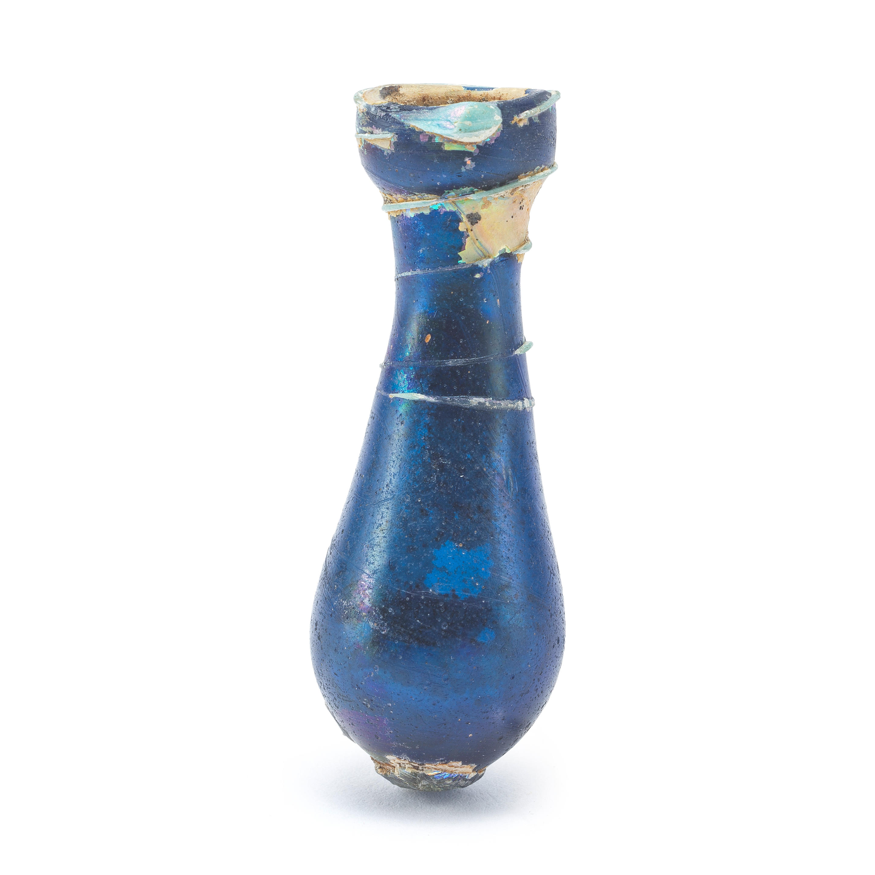 Appraisal: A MINIATURE ROMAN BLUE GLASS UNGUENTARIUM A miniature Roman blue