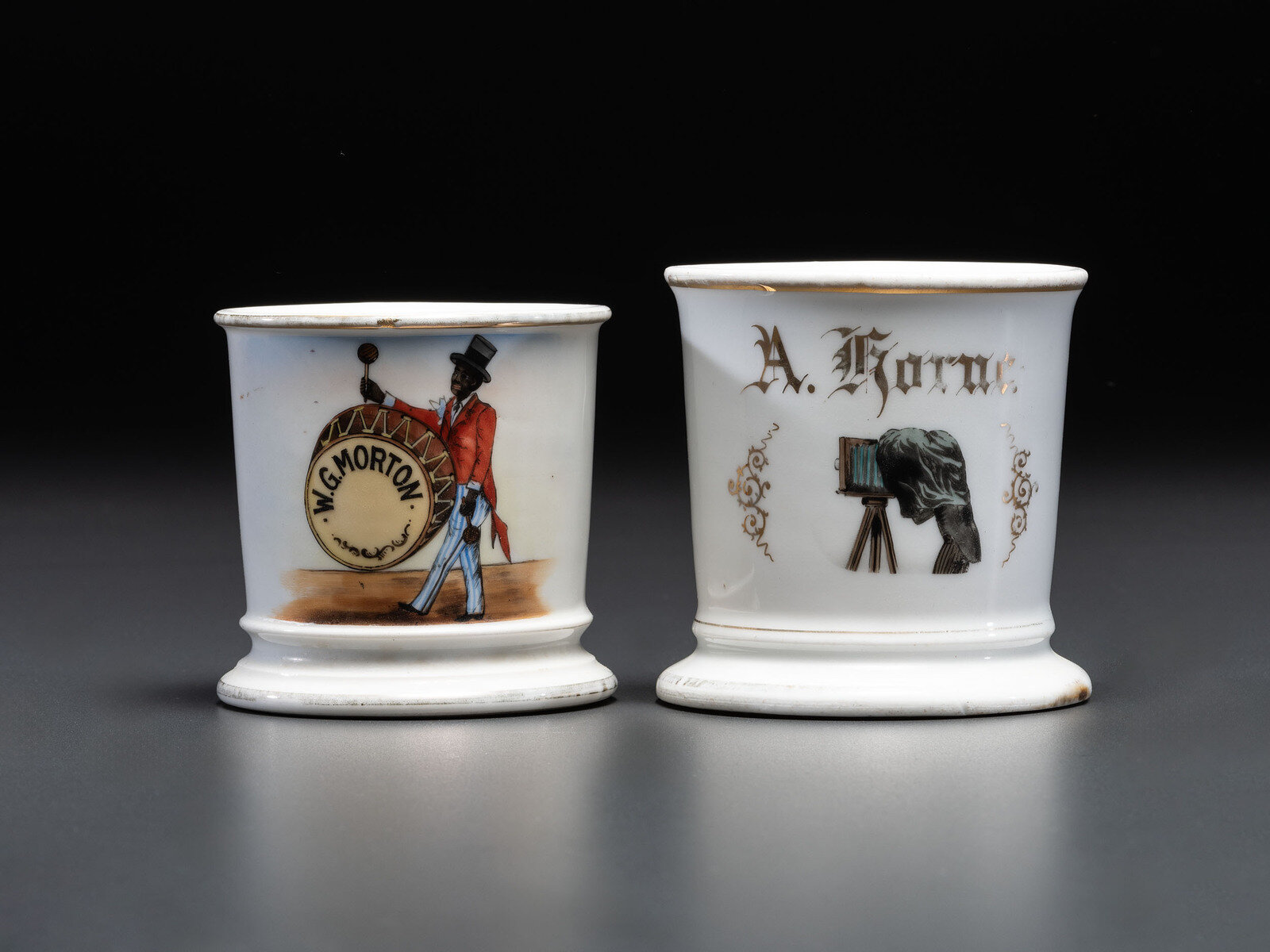 Appraisal: Two Porcelain Occupational Shaving Mugs Late th Early th Century