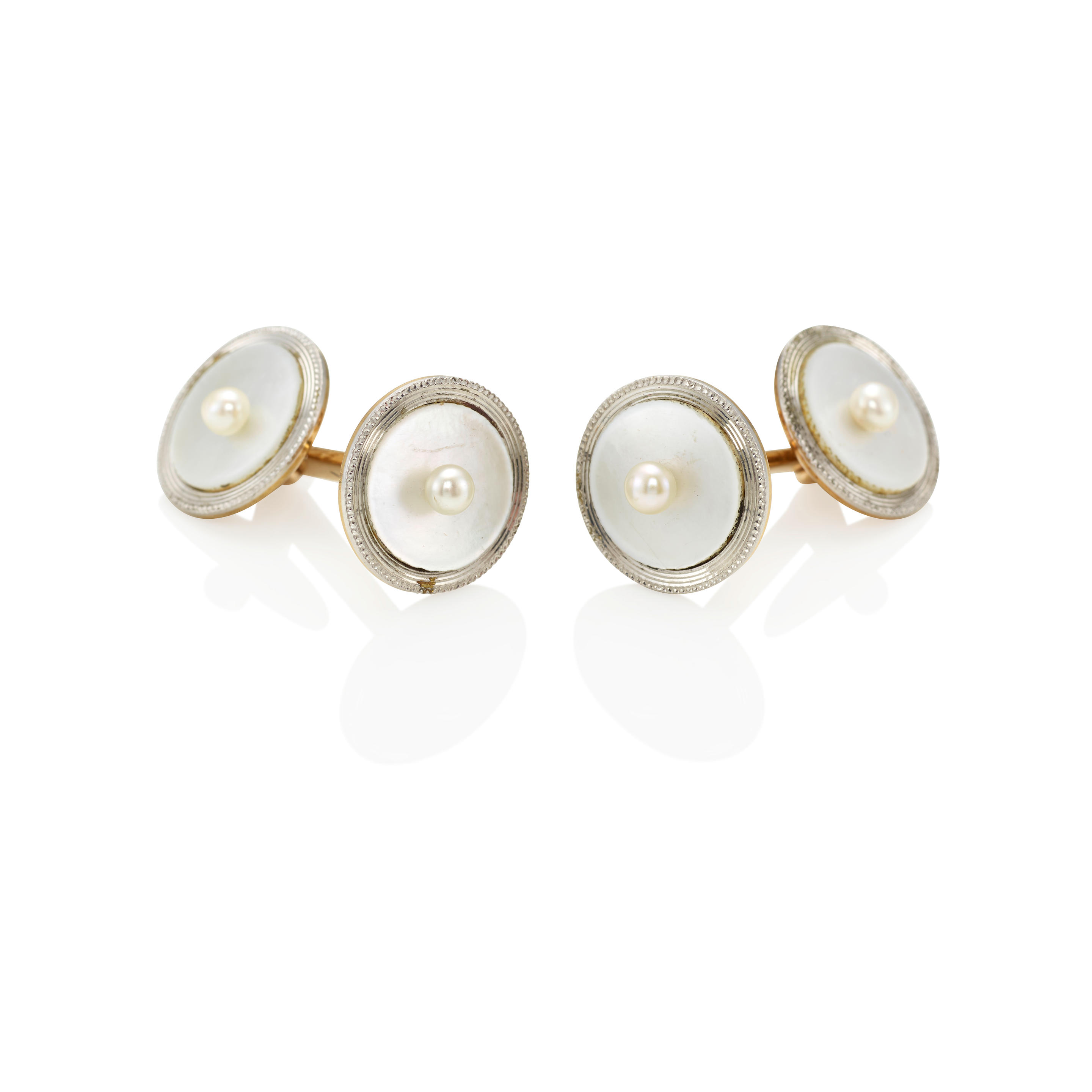 Appraisal: CARTIER A PAIR OF PLATINUM K GOLD PEARL AND MOTHER-OF-PEARL