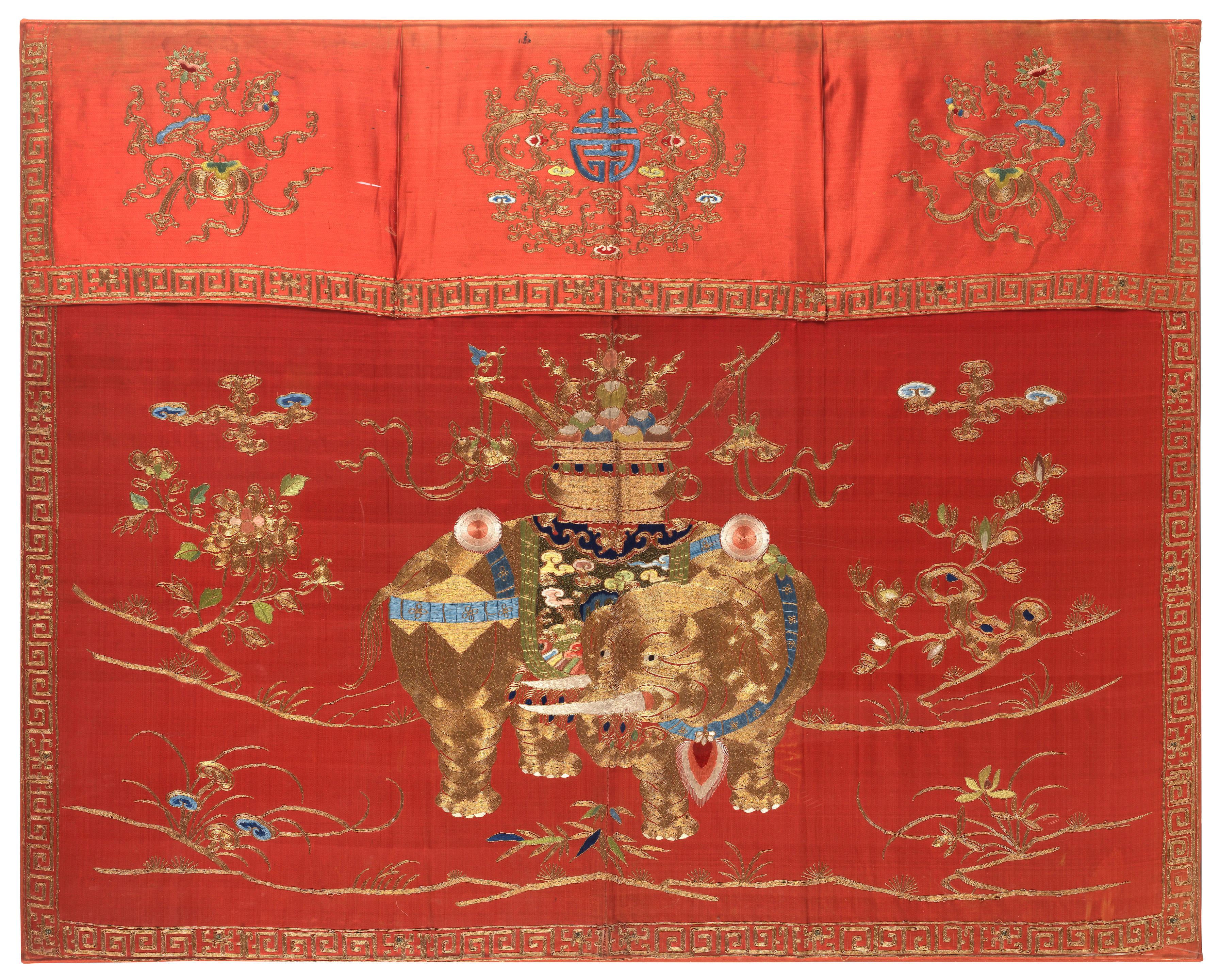 Appraisal: AN EMBROIDERED SILK CORAL-GROUND 'ELEPHANT' ALTAR FRONTAL th century The