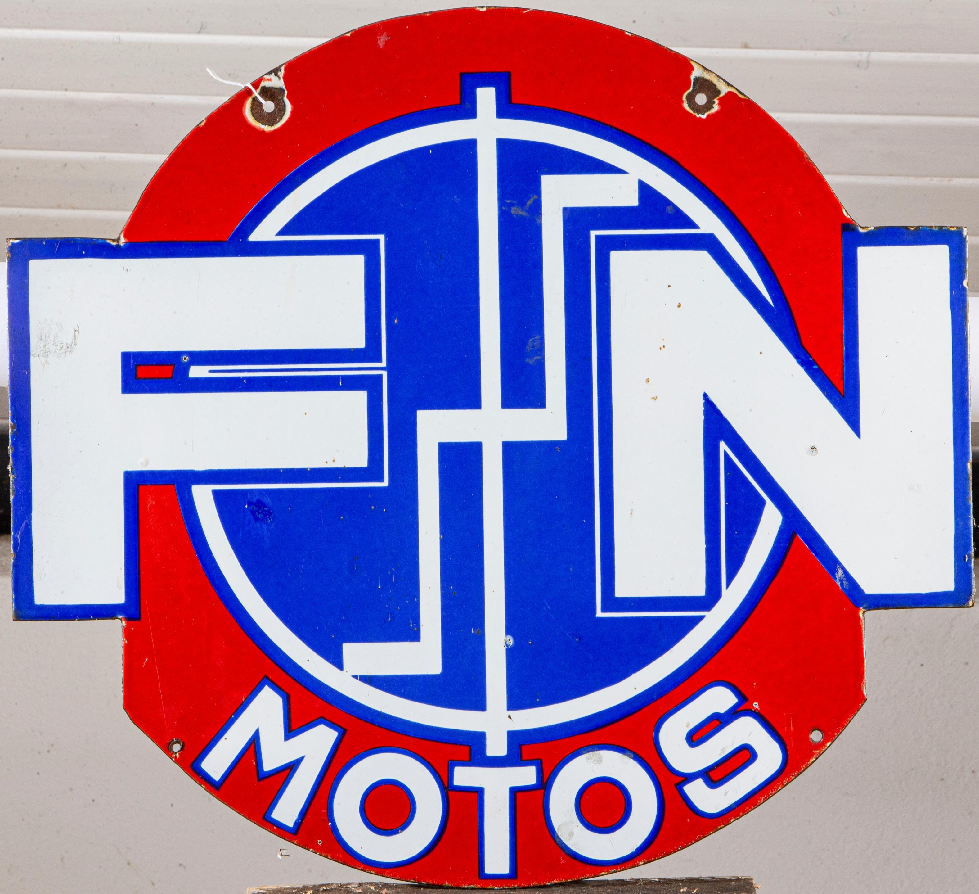 Appraisal: AN FABRIQUE NATIONALE MOTOS ENAMEL SIGN Belgian double-sided in red