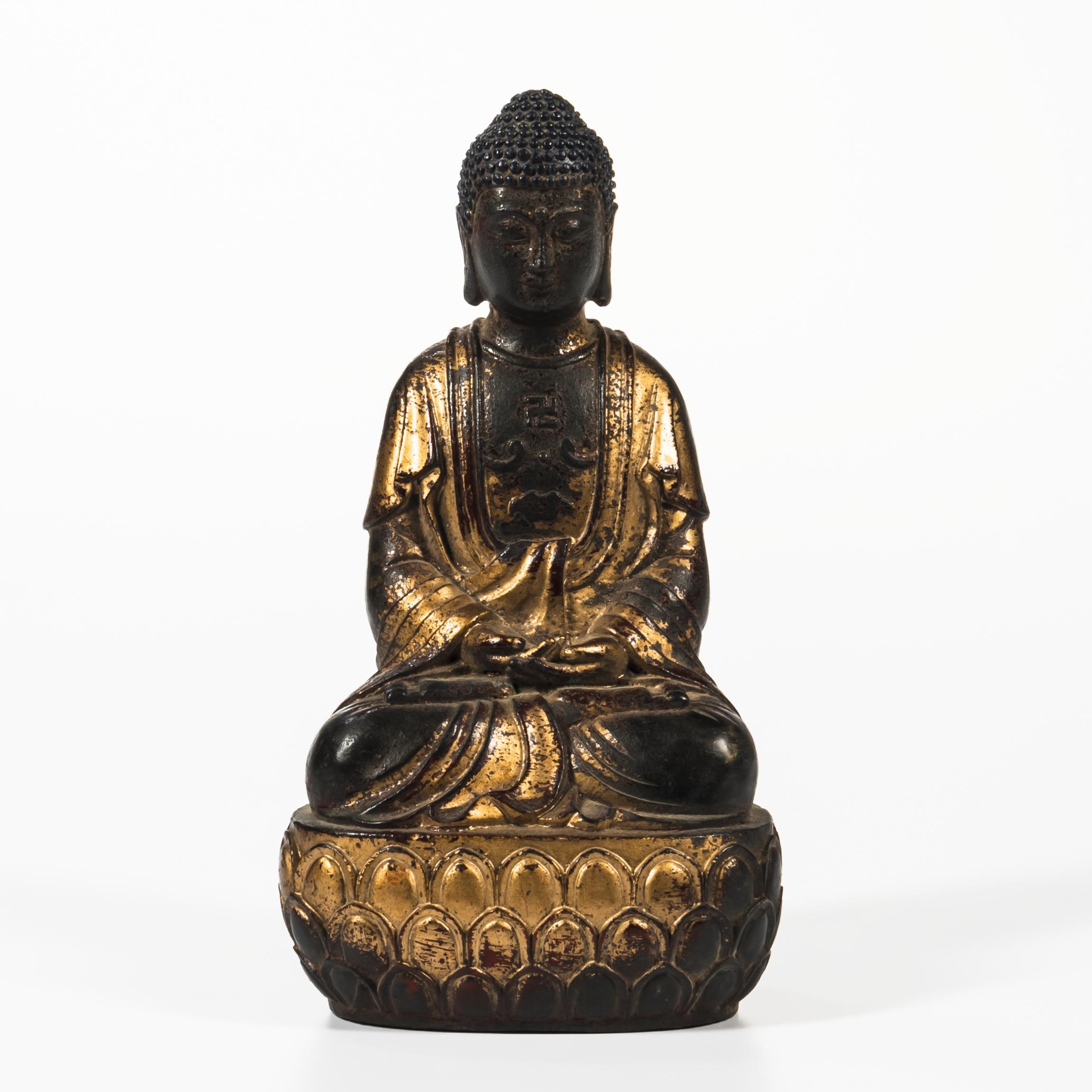 Appraisal: GILT-BRONZE BUDDHA China th century seated cross-legged on a lotus