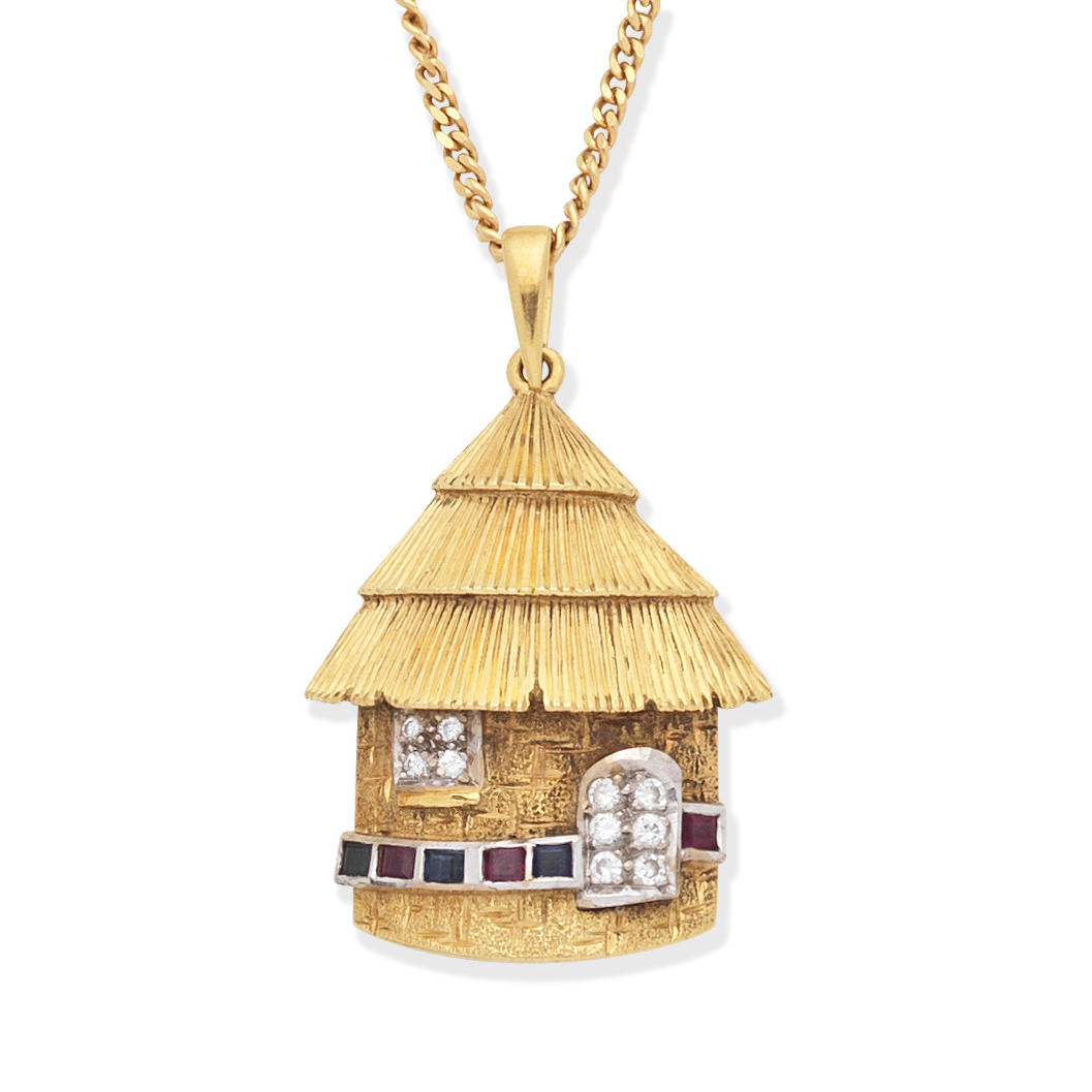 Appraisal: DIAMOND SAPPHIRE AND RUBY-SET PENDANT NECKLACE Designed as a hut