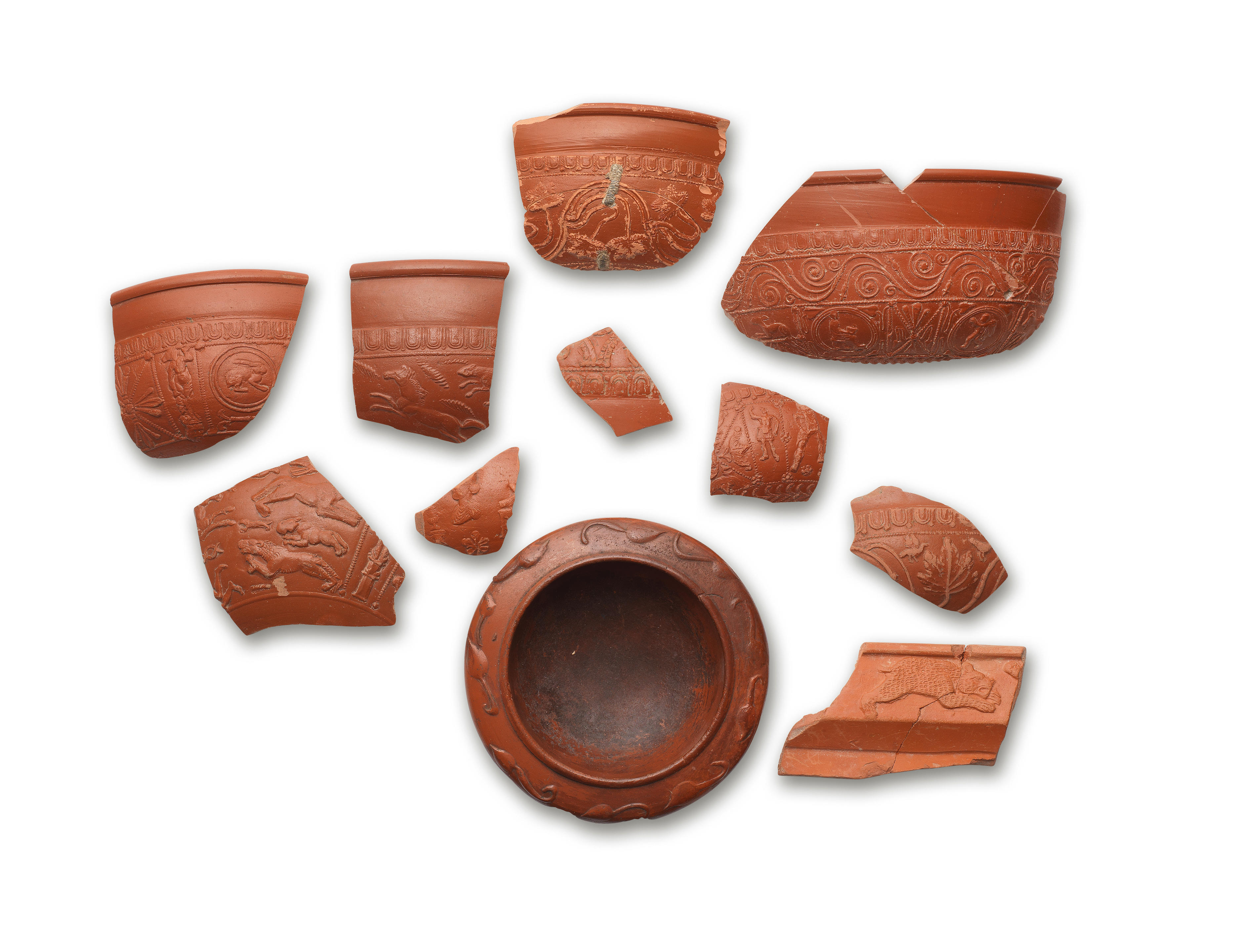 Appraisal: A ROMAN POTTERY SAMIAN WARE BOWL NINE SAMIAN WARE BOWL