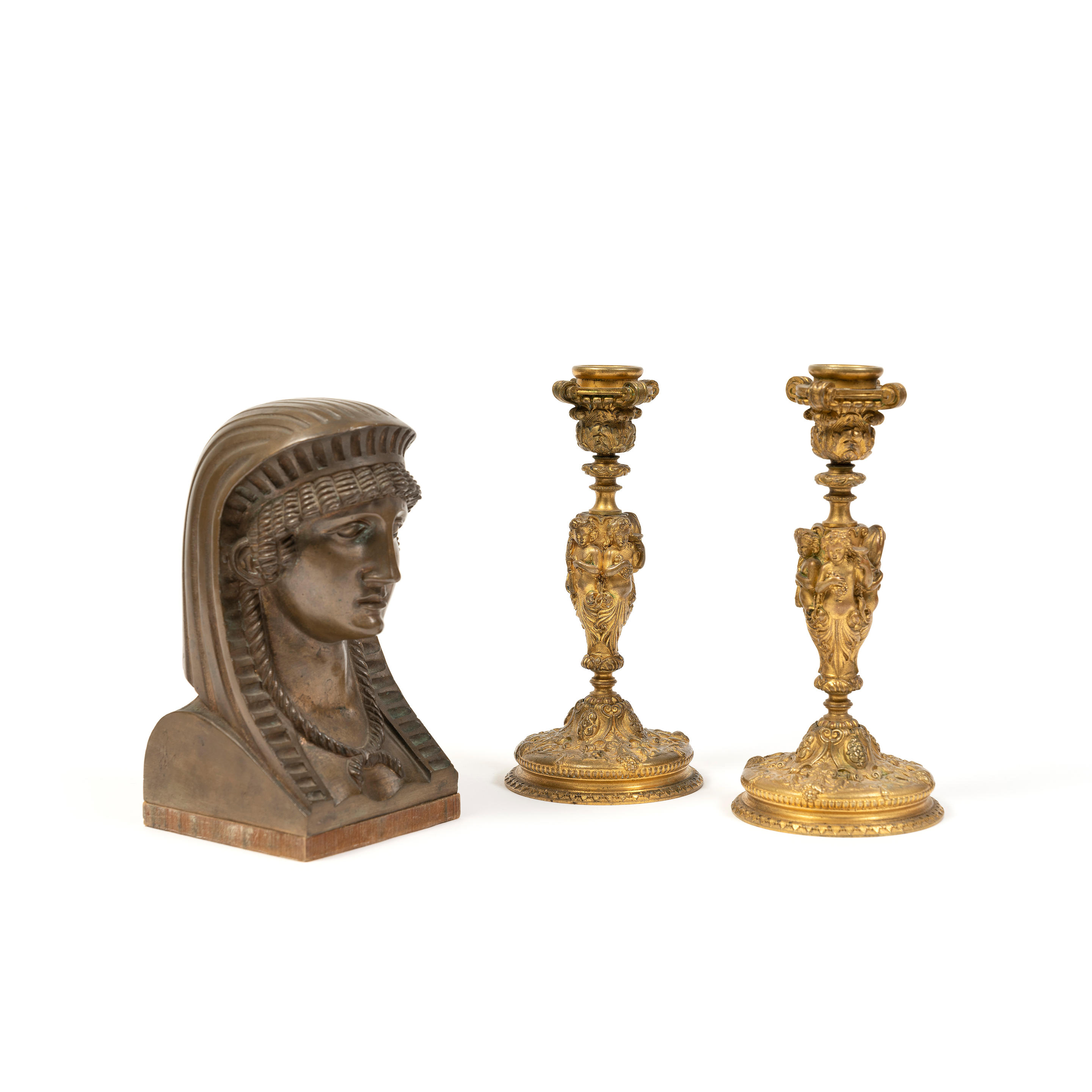 Appraisal: A PAIR OF TH CENTURY BRONZE CANDLESTICKS AND A SIMILAR