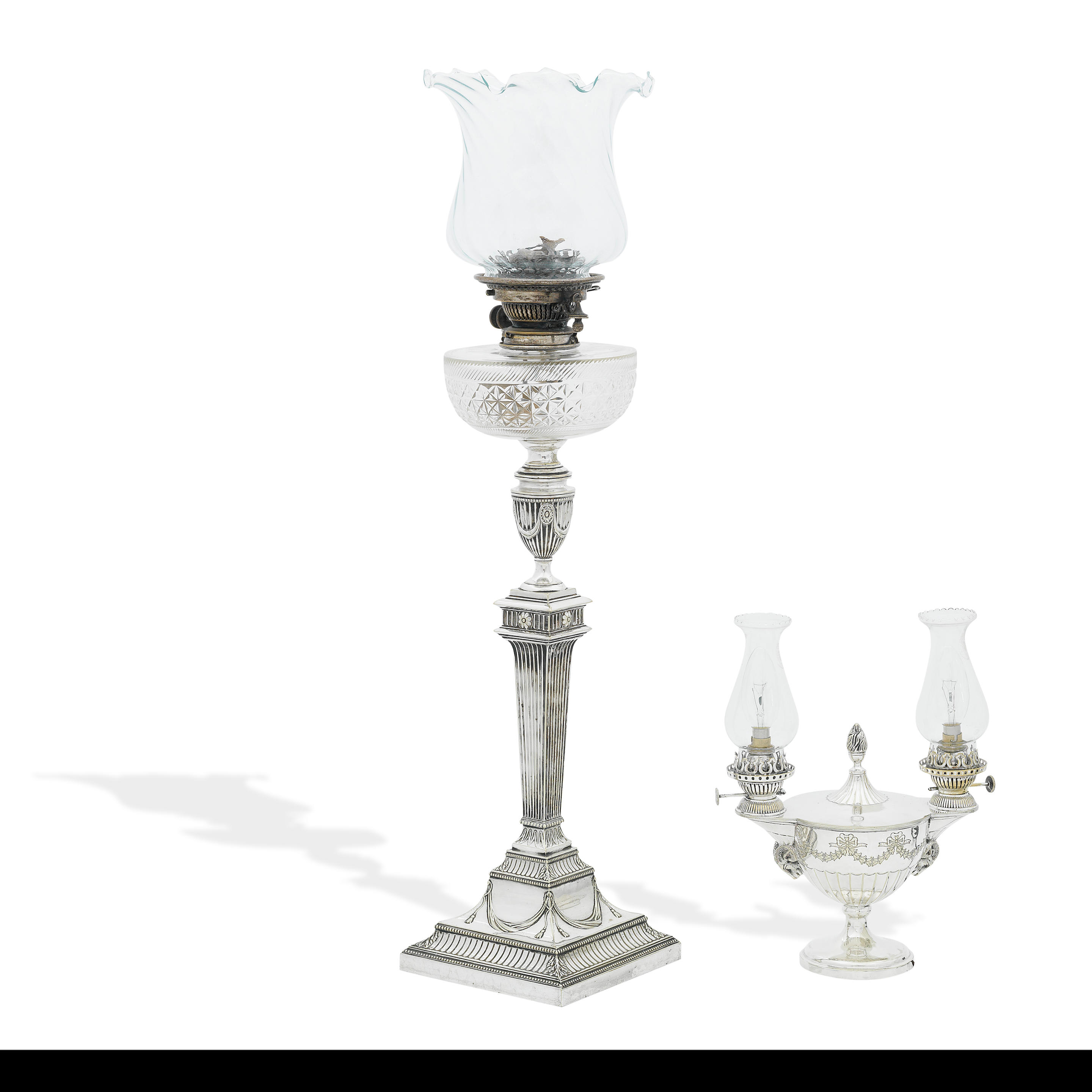 Appraisal: AN EDWARDIAN NEOCLASSICAL ELECTROPLATED PARAFFIN LAMP On square pedestal base