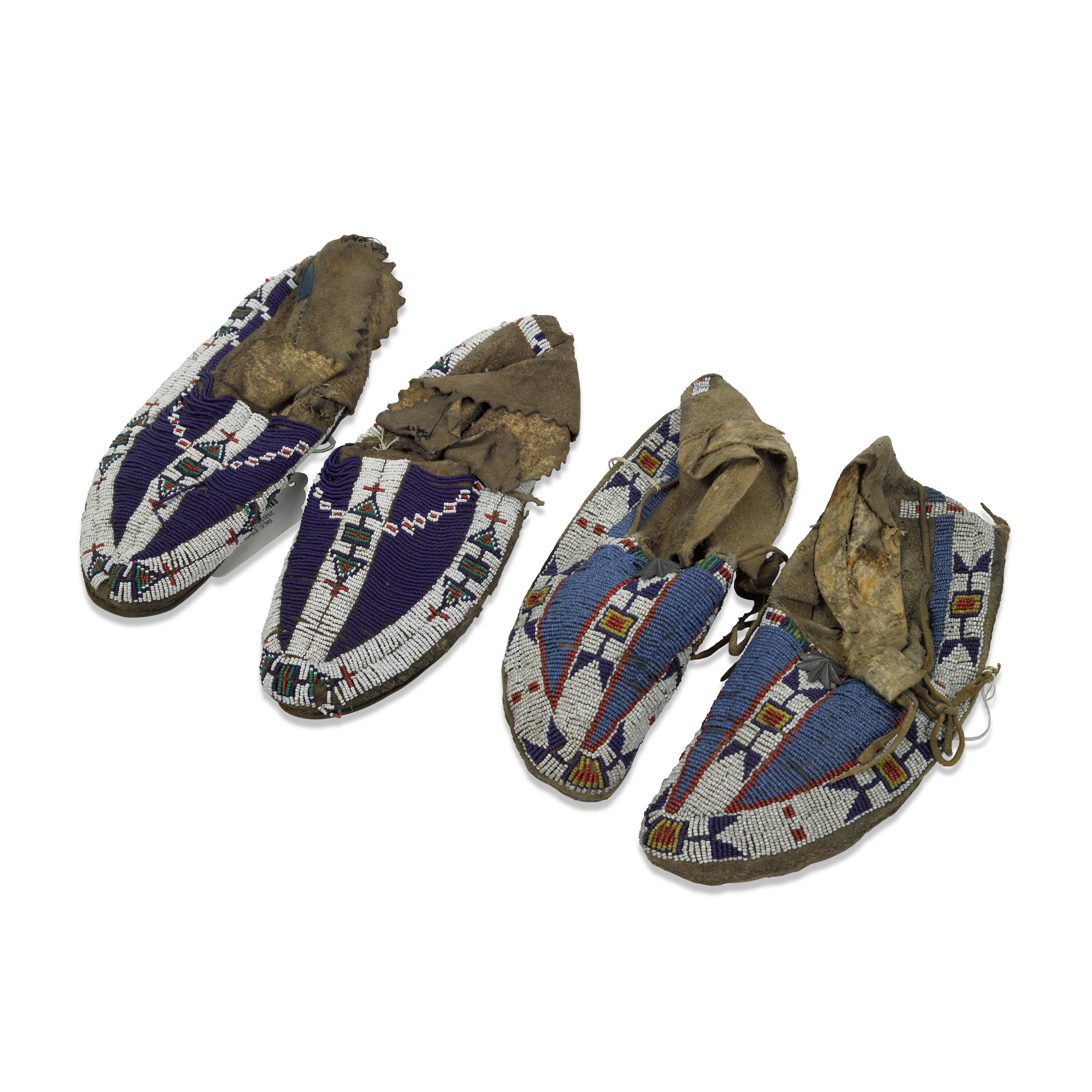 Appraisal: TWO PAIRS OF LAKOTA SIOUX OR TSIS TSIS'TAS CHEYENNE MOCCASINS