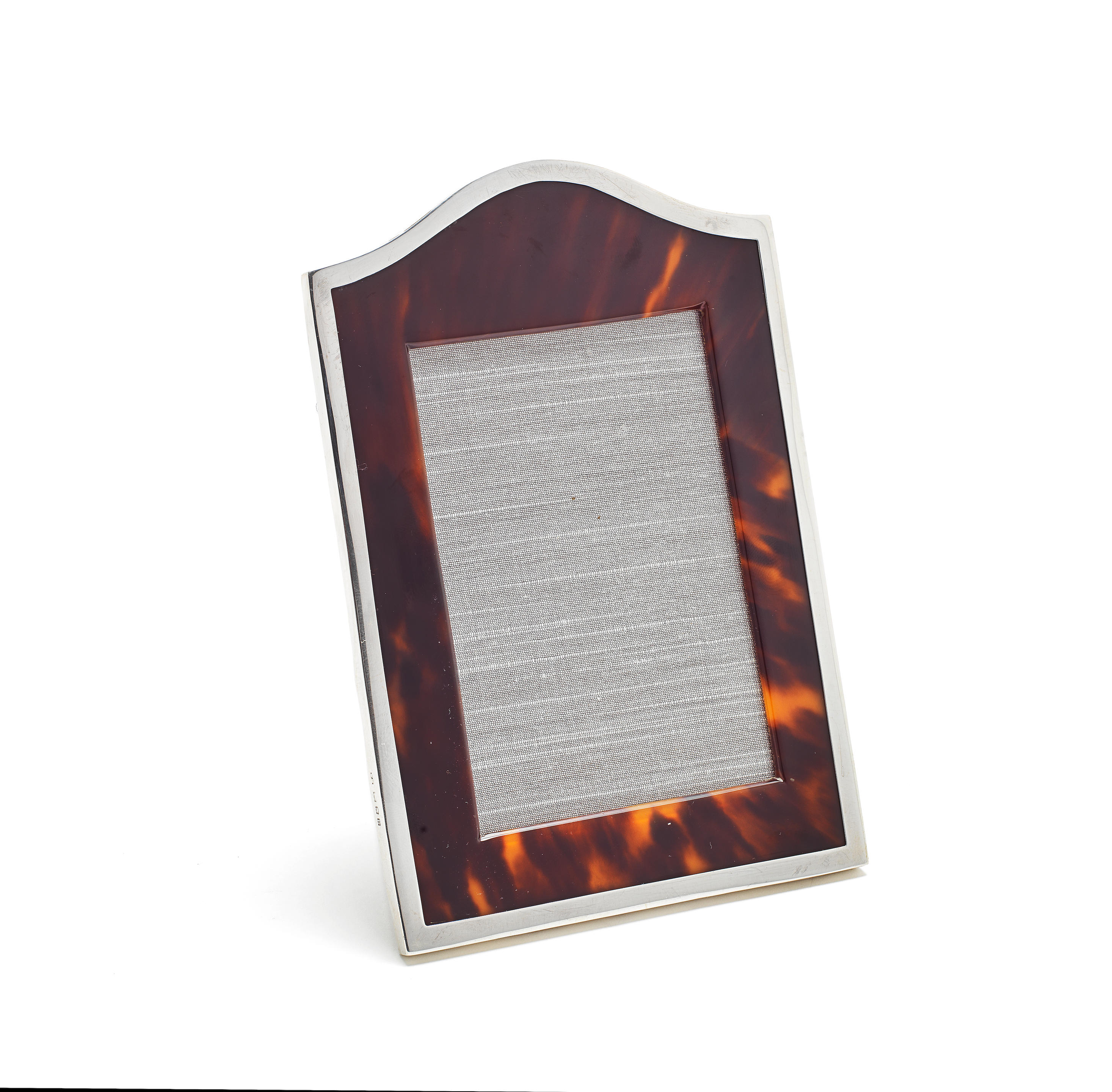 Appraisal: A SILVER-MOUNTED TORTOISESHELL PHOTOGRAPH FRAME Frederick Hopkins London Upright rectangular