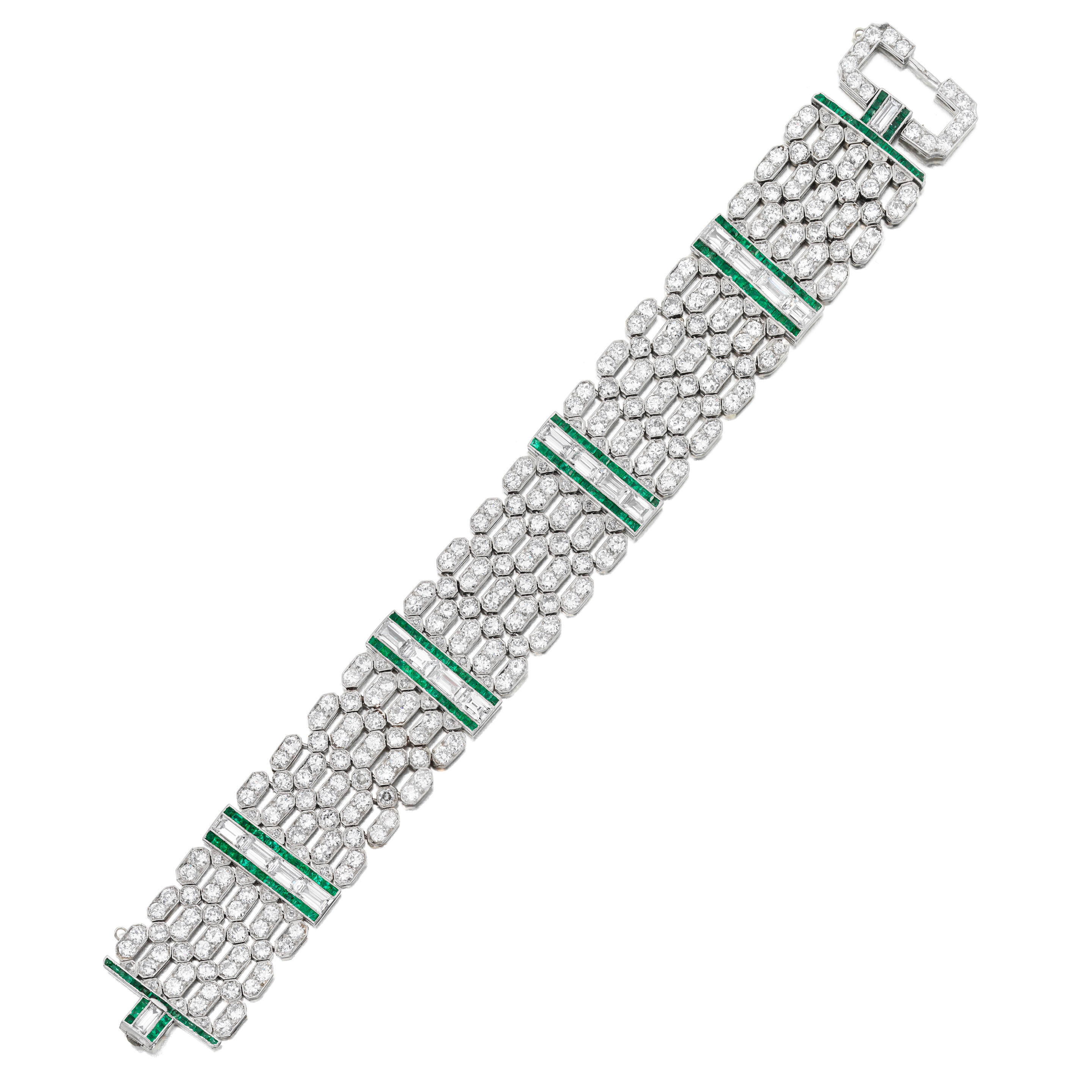 Appraisal: A DIAMOND AND EMERALD BRACELET CIRCA Designed as five rows