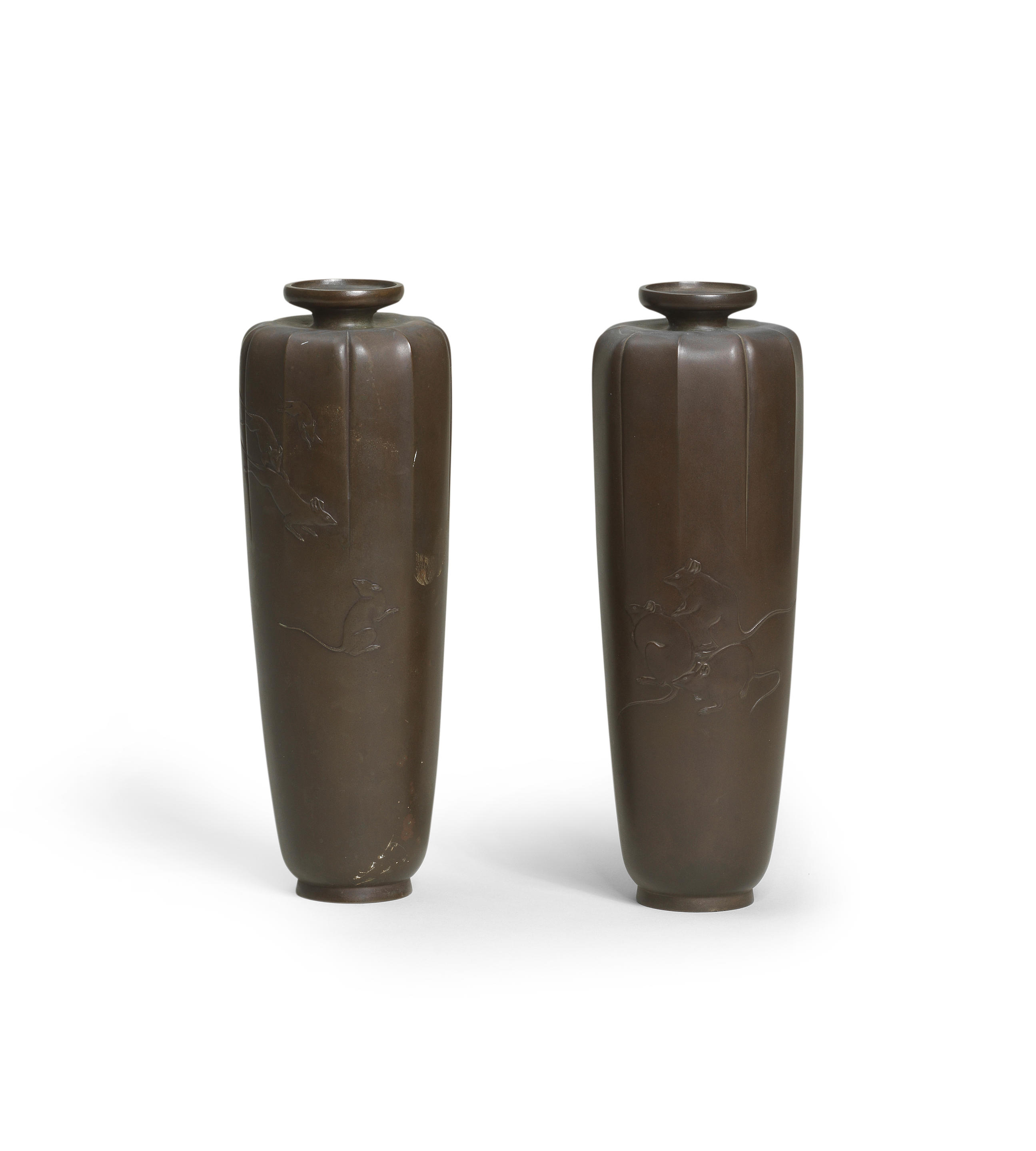 Appraisal: KIYOSHI SEIJI A Pair of Bronze Slender Ribbed Vases Meiji