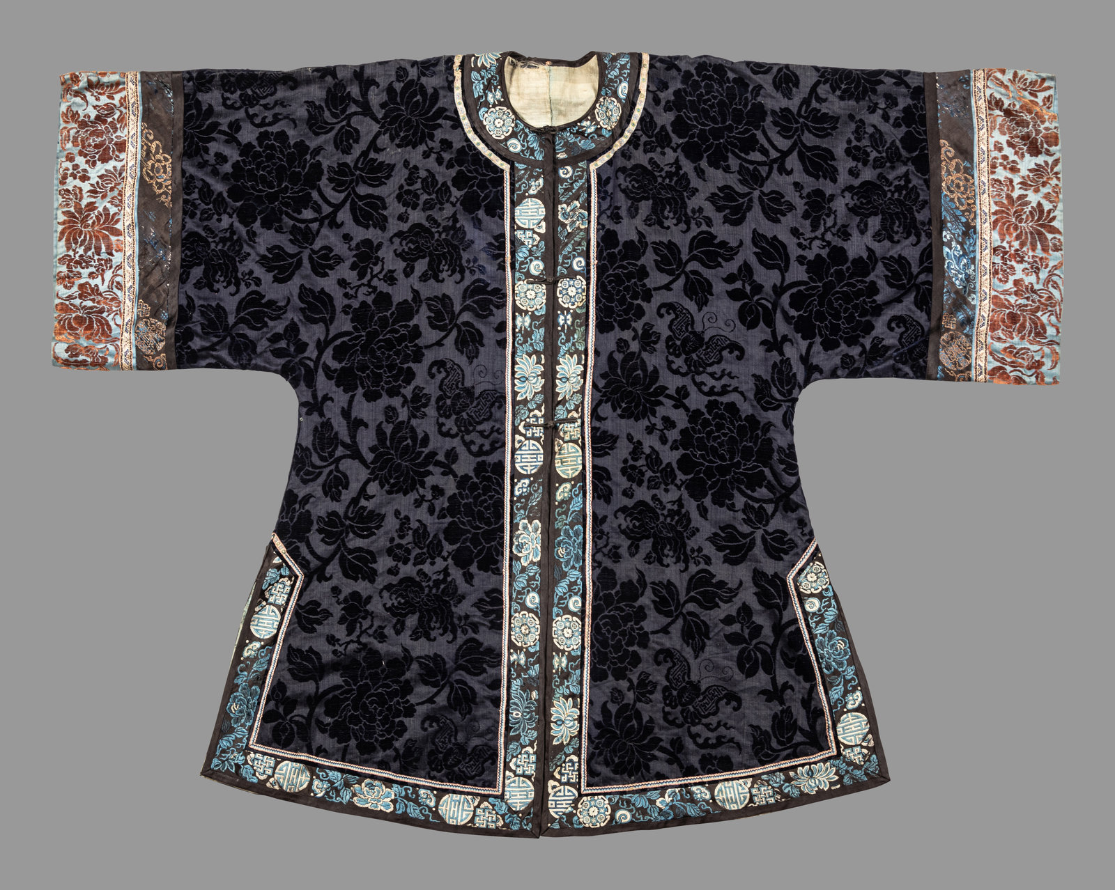 Appraisal: A Dark Navy Ground Cut Velvet and Embroidered Silk Lady's