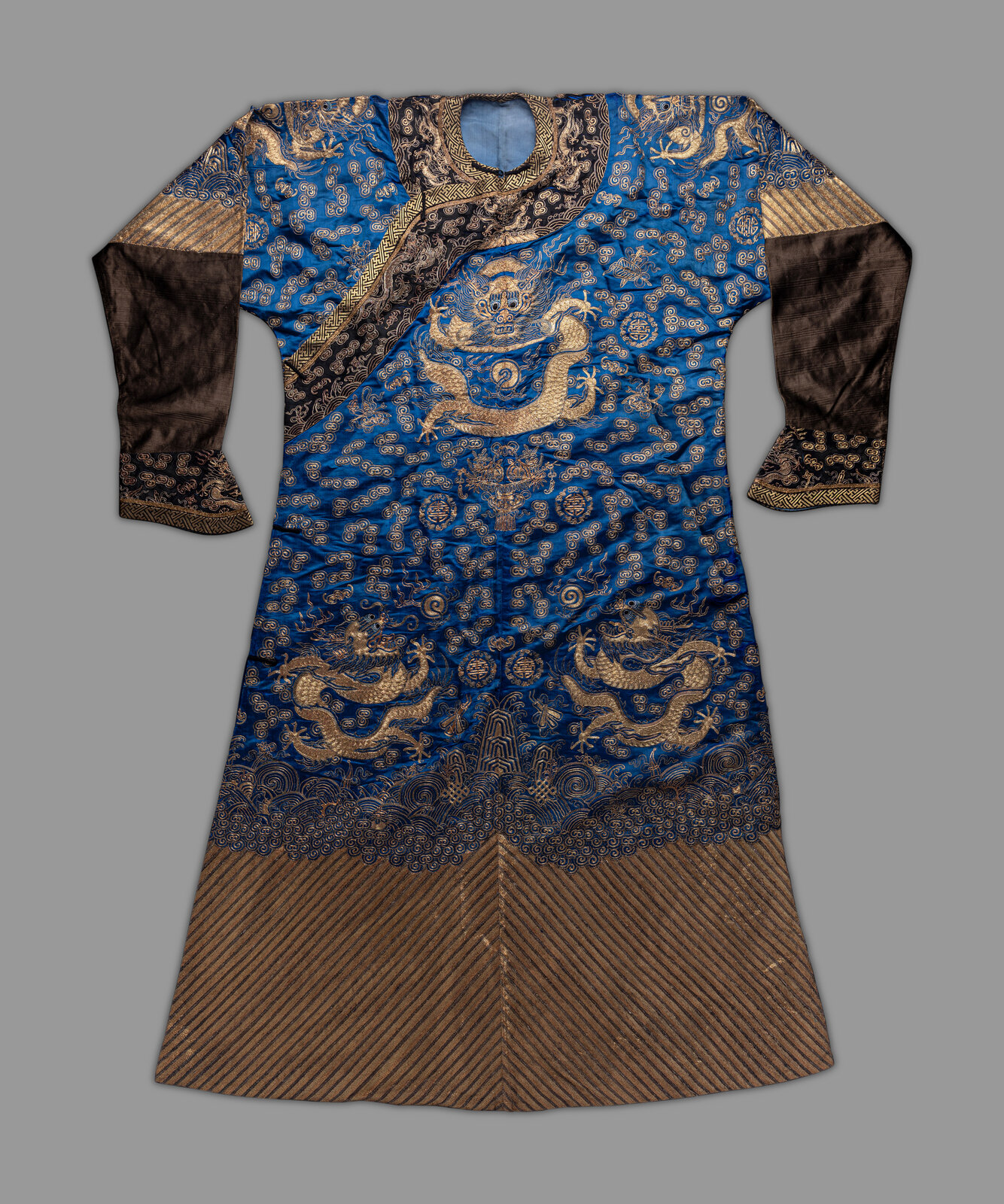 Appraisal: A Chinese Blue Ground Embroidered Silk Dragon Robe Late th