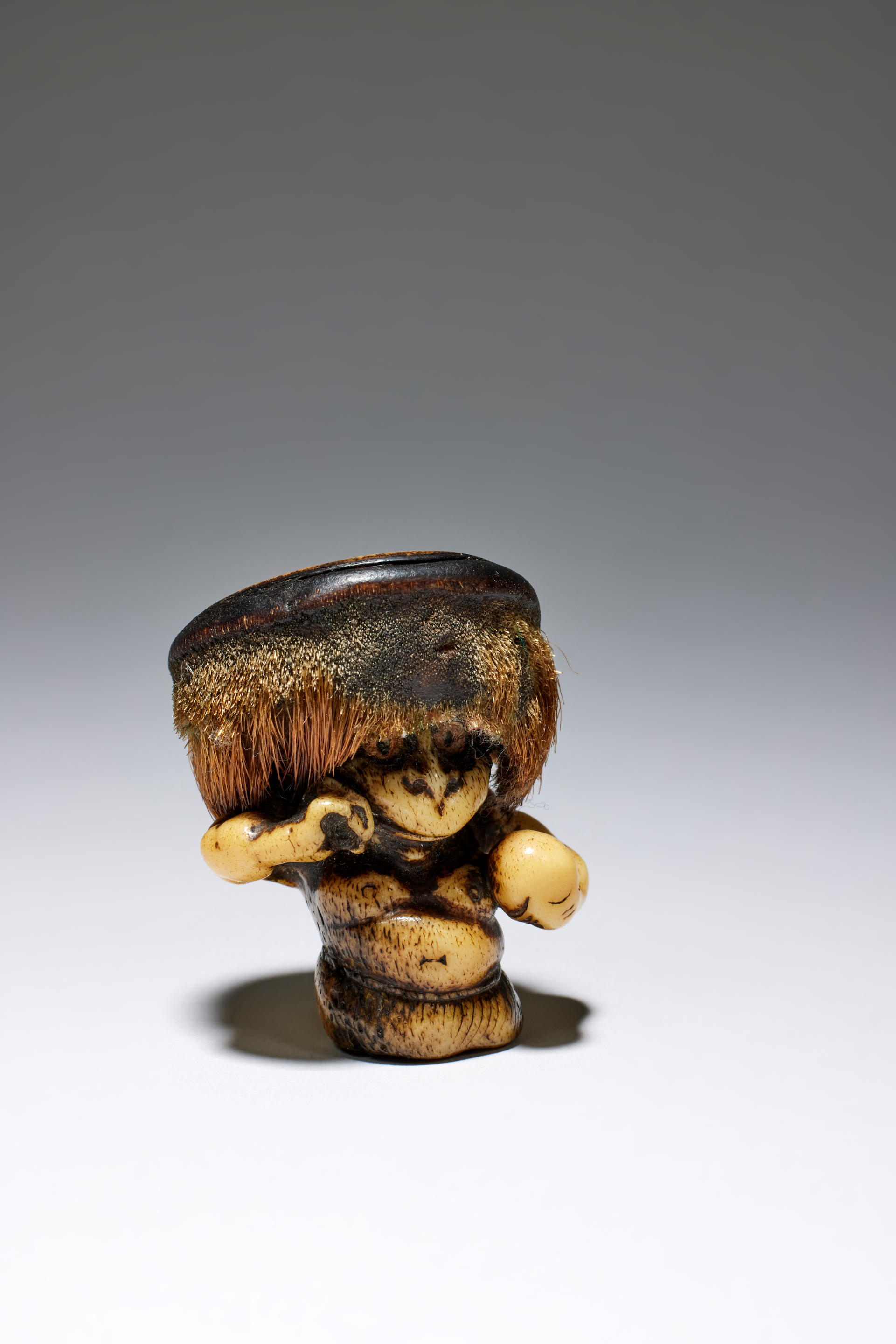 Appraisal: NETSUKE EN BOIS DE CERF REPR SENTANT UN KAPPA XIXe