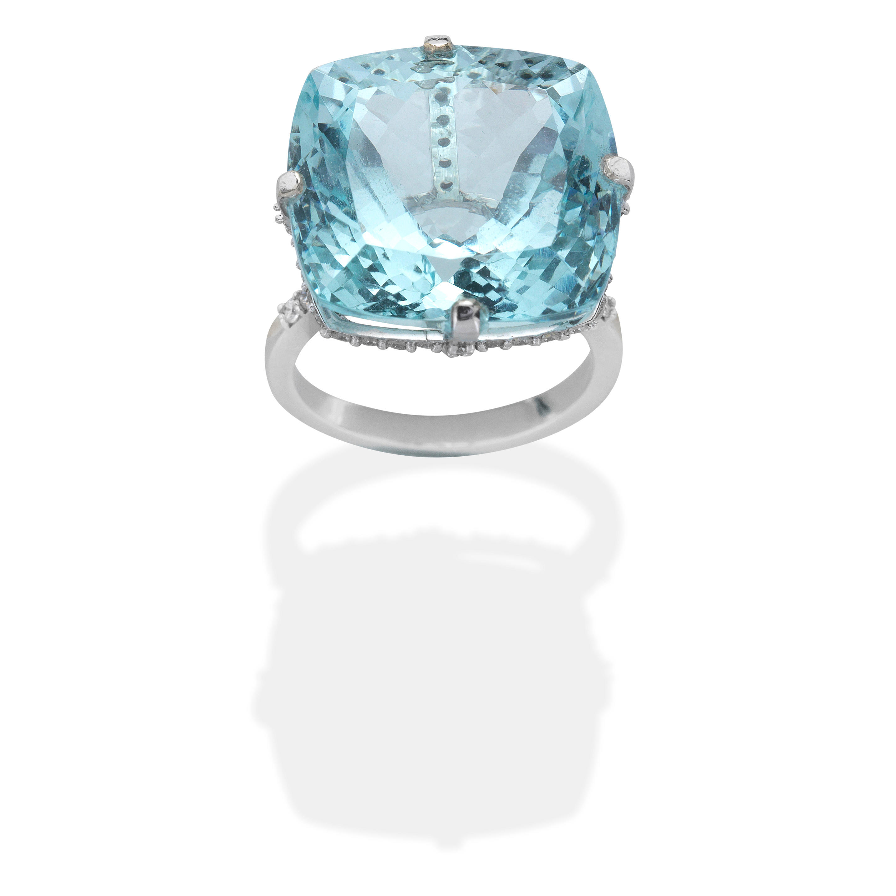 Appraisal: AQUAMARINE AND DIAMOND RING Cushion-shaped aquamarine gallery accented by brilliant-cut