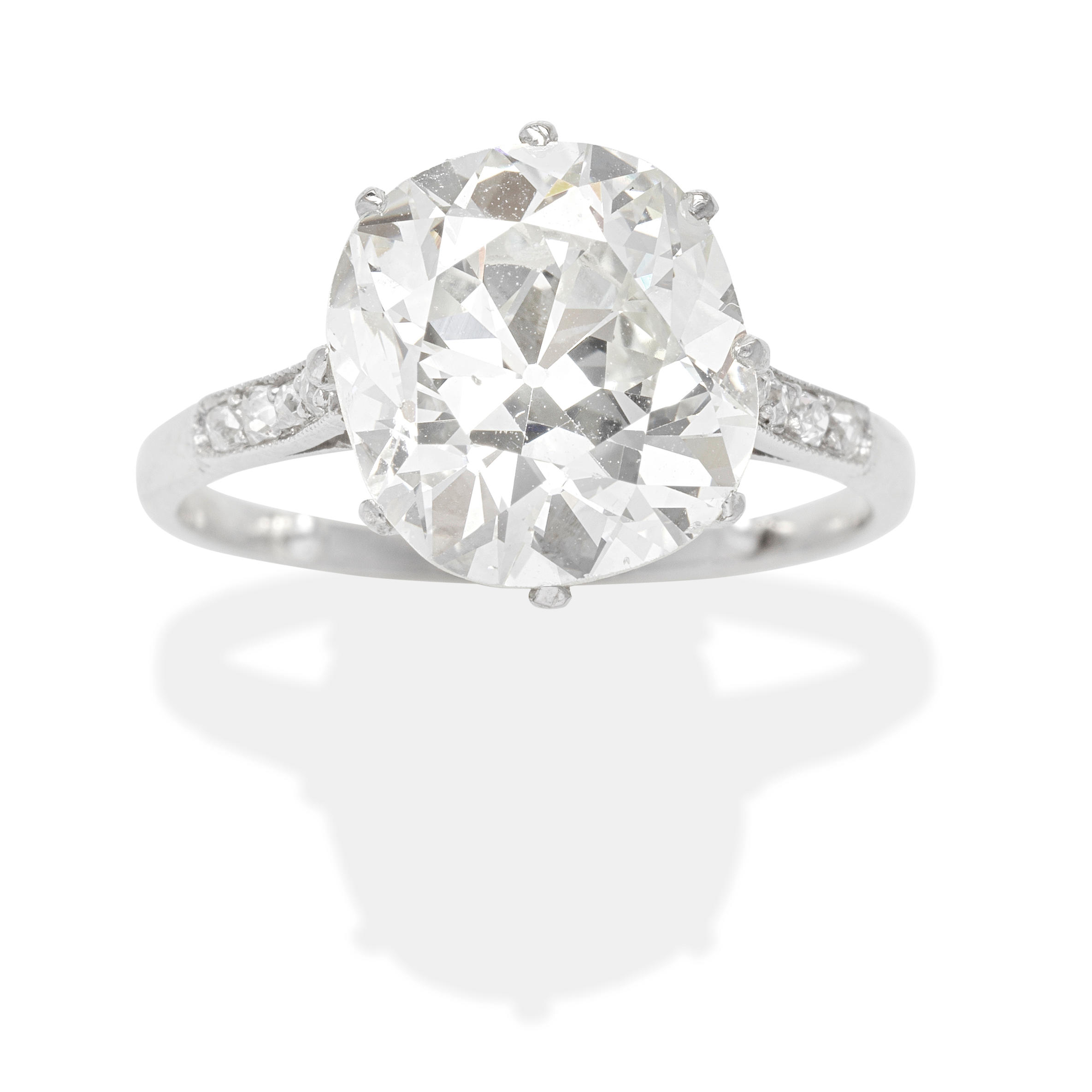 Appraisal: DIAMOND SINGLE-STONE RING The cushion-shaped diamond weighing carats between diamond-set