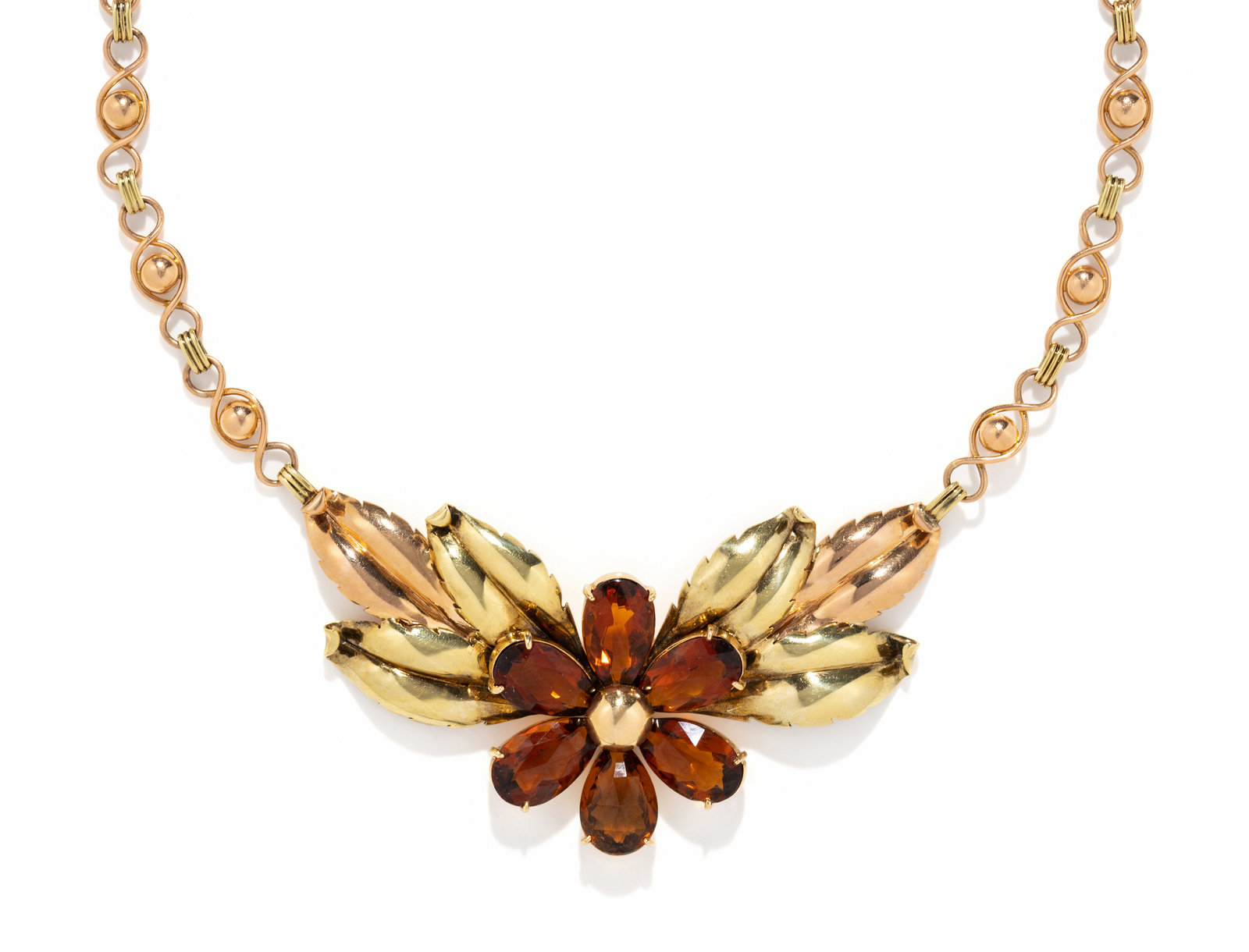 Appraisal: RETRO BICOLOR GOLD AND CITRINE FLOWER NECKLACE Containing six pear