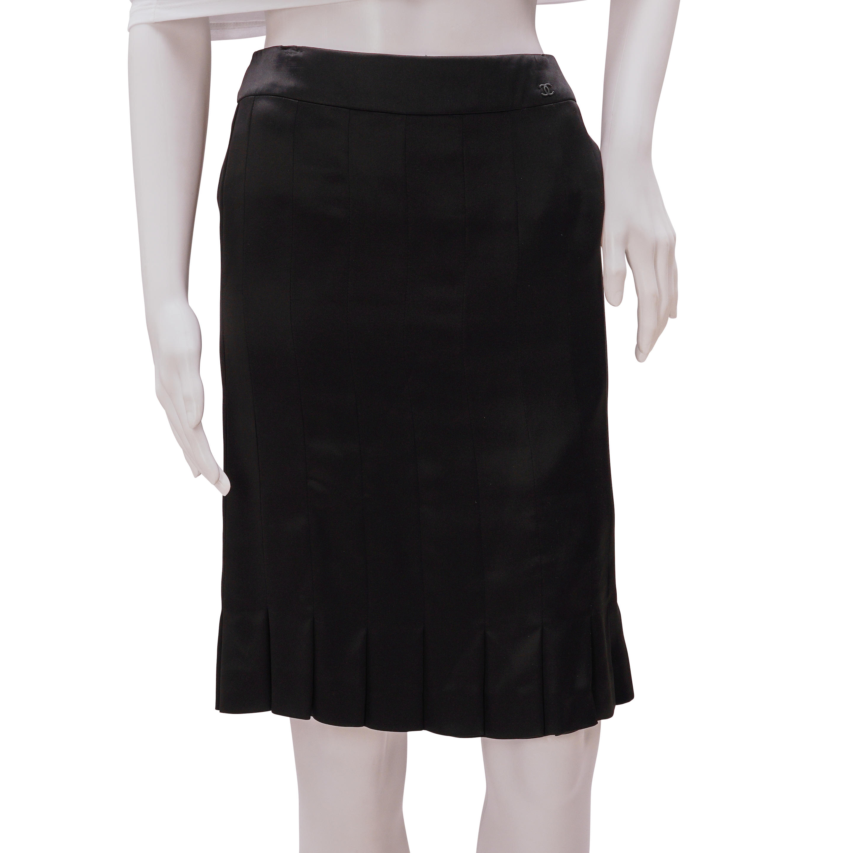 Appraisal: TWO CHANEL BLACK SKIRTS One is a silk skirt with