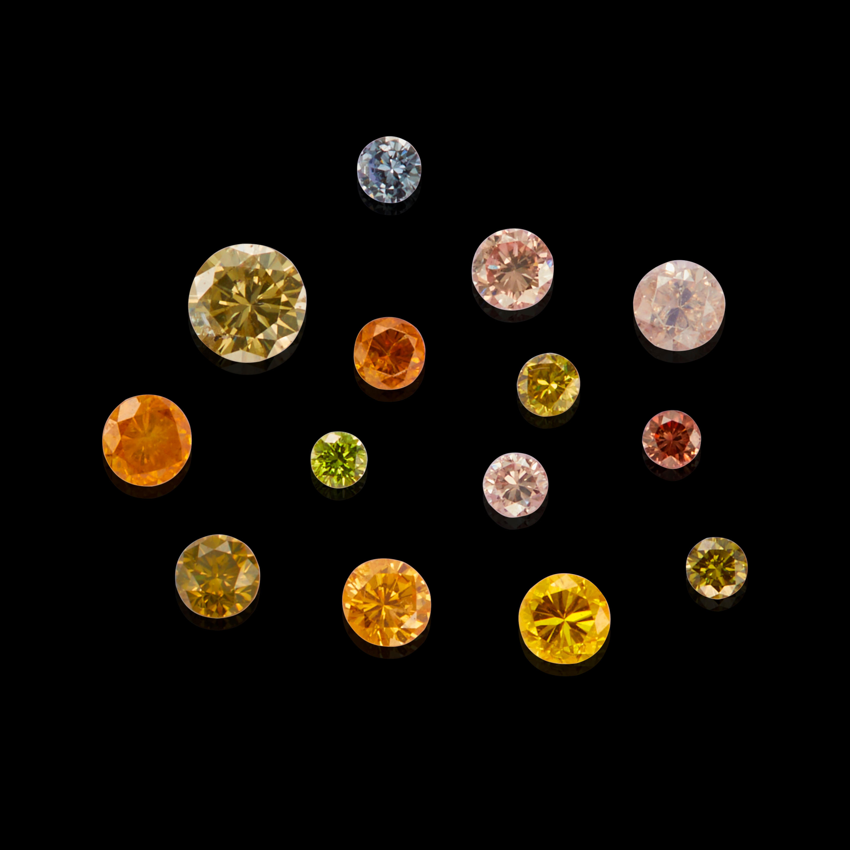 Appraisal: FOURTEEN FANCY-COLORED DIAMONDS All faceted as circular-cuts including various colors