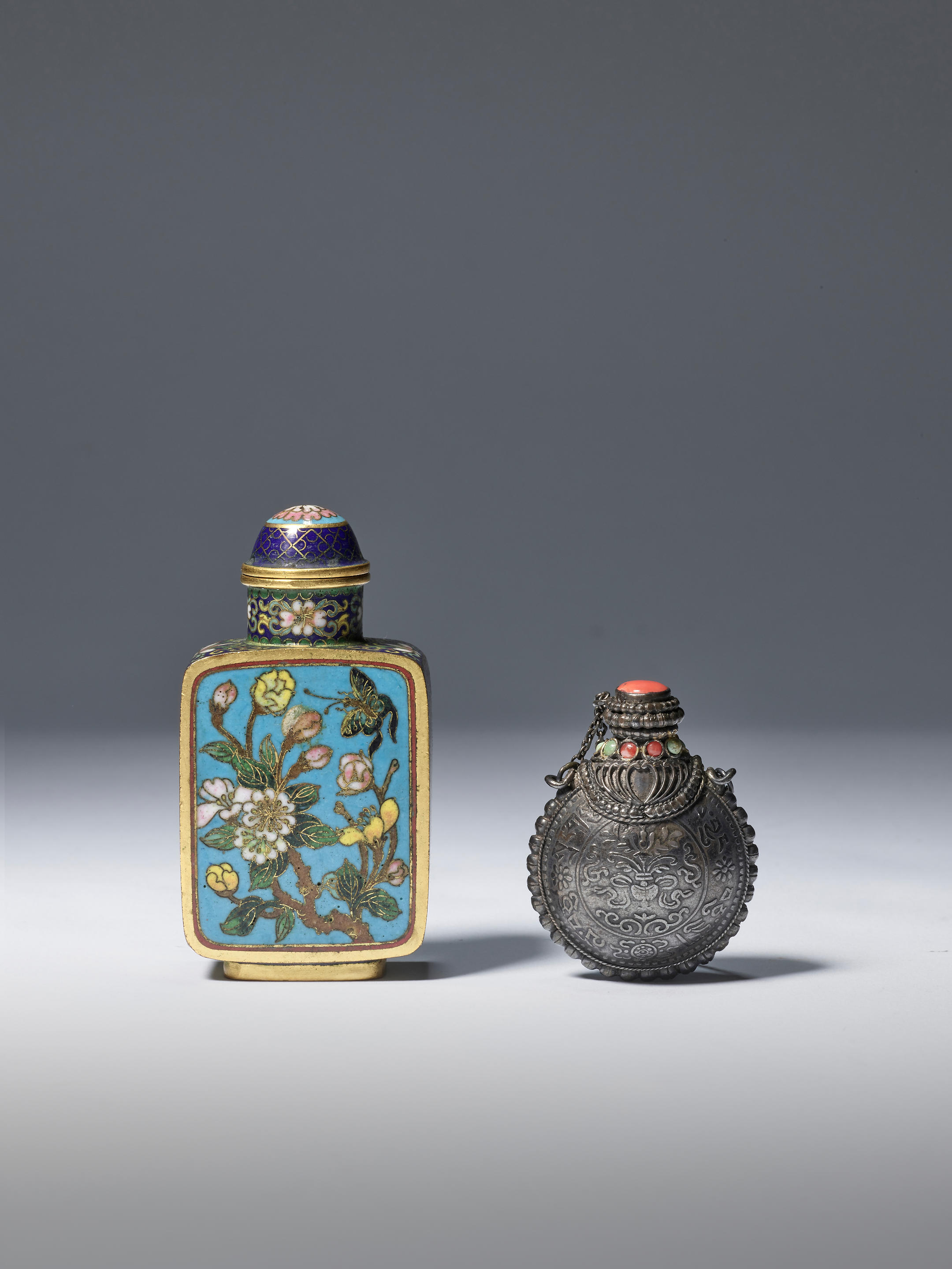 Appraisal: TWO SNUFF BOTTLES Comprising a cloisonne enamel snuff bottle Qianlong