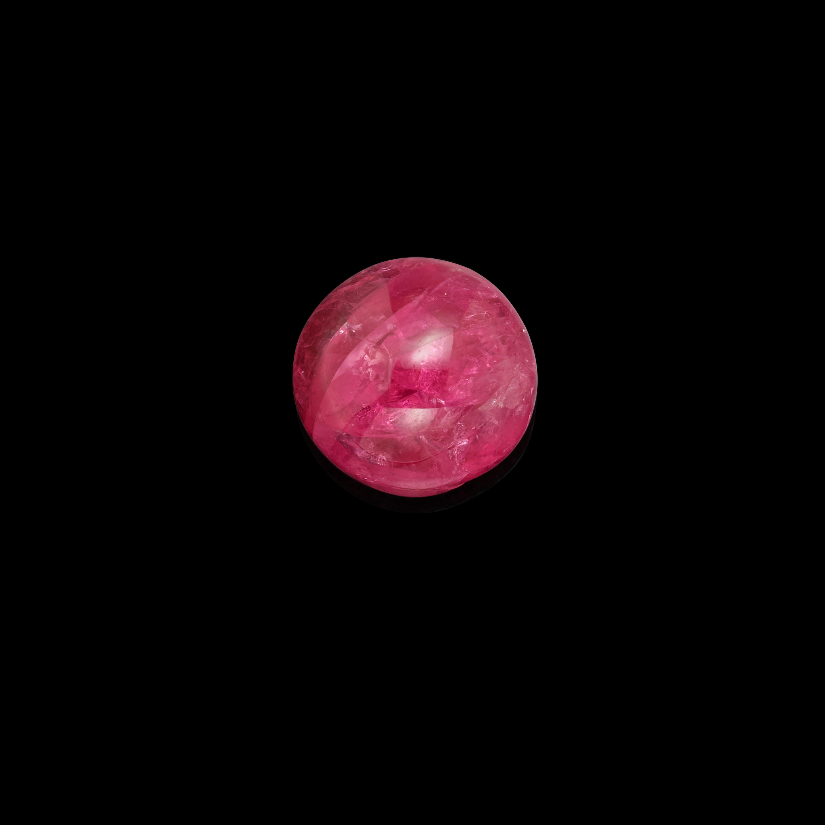 Appraisal: SPINEL CABOCHON Burma A circular cabochon spinel of pleasing pinkish