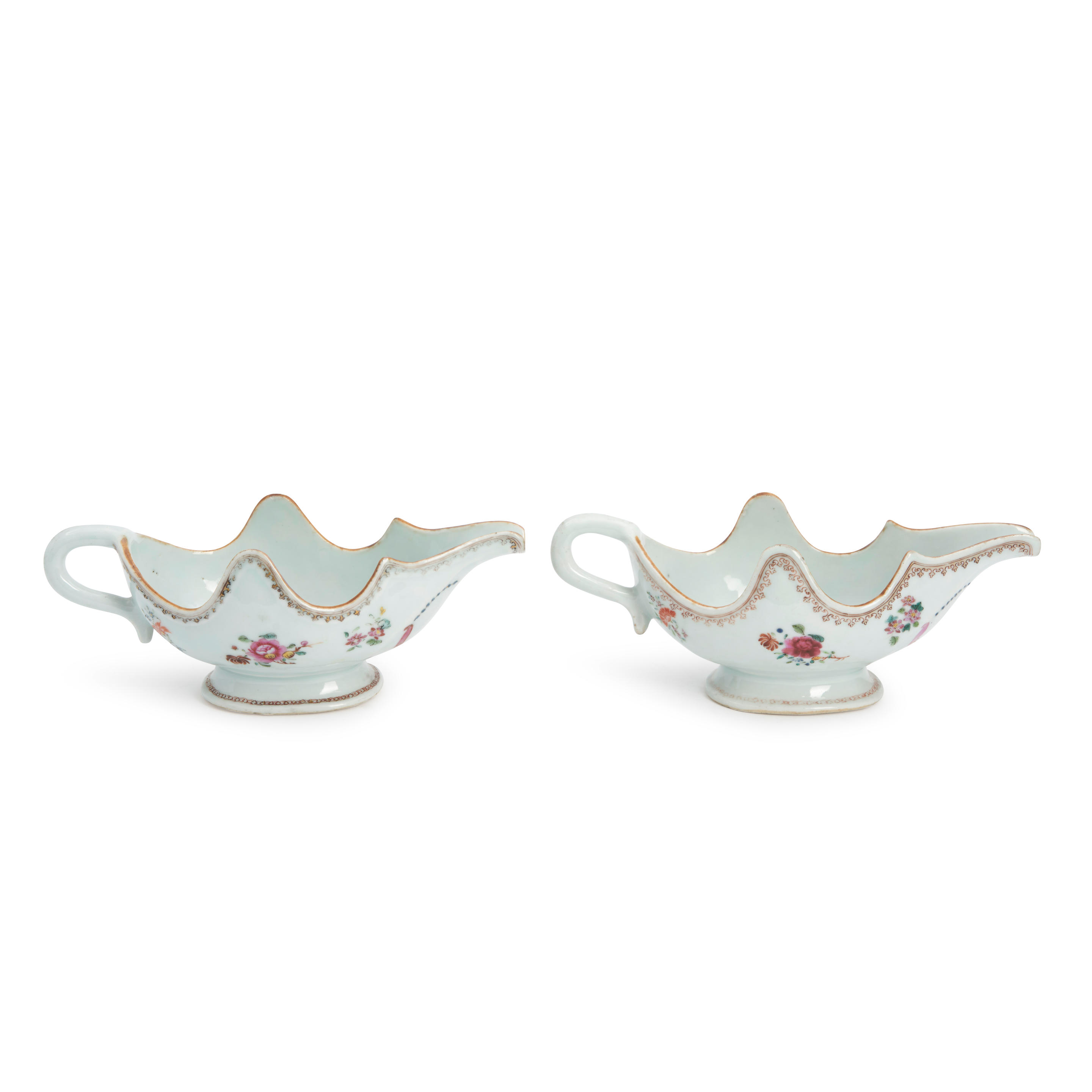 Appraisal: PAIR OF ARMORIAL PORCELAIN SAUCE BOATS WITH THE ARMS OF