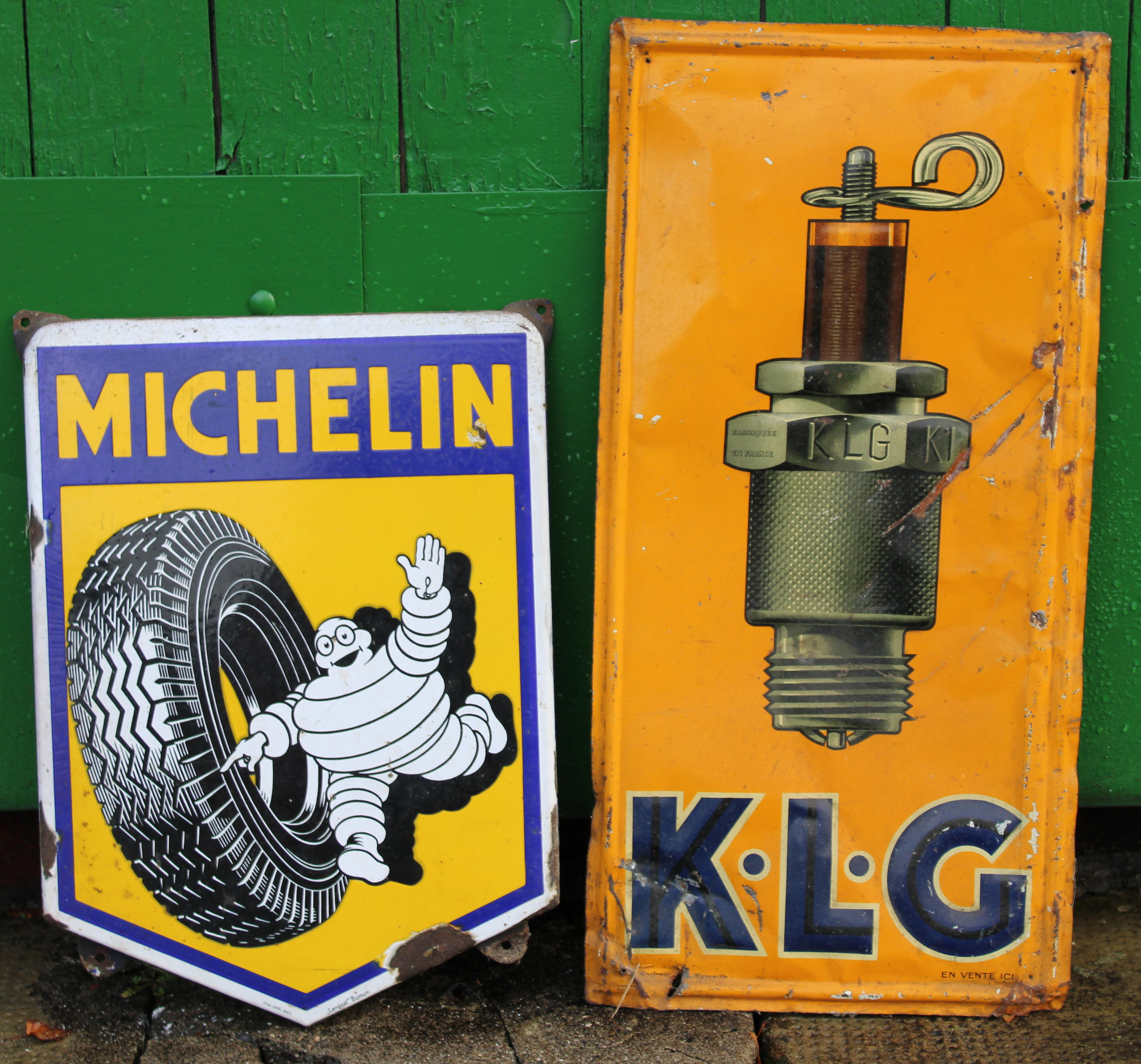 Appraisal: TWO ADVERTISING SIGNS comprising enamel Michelin shield x cm with