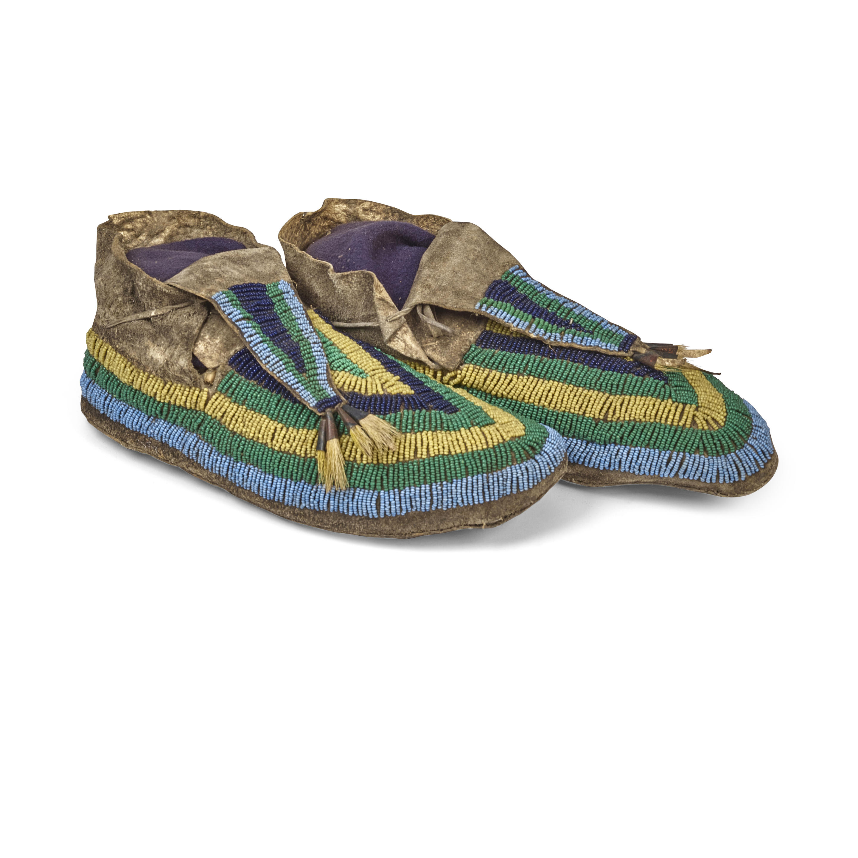 Appraisal: A PAIR OF PLAINS BEADED MOCCASINS Likely Lakota Sioux of