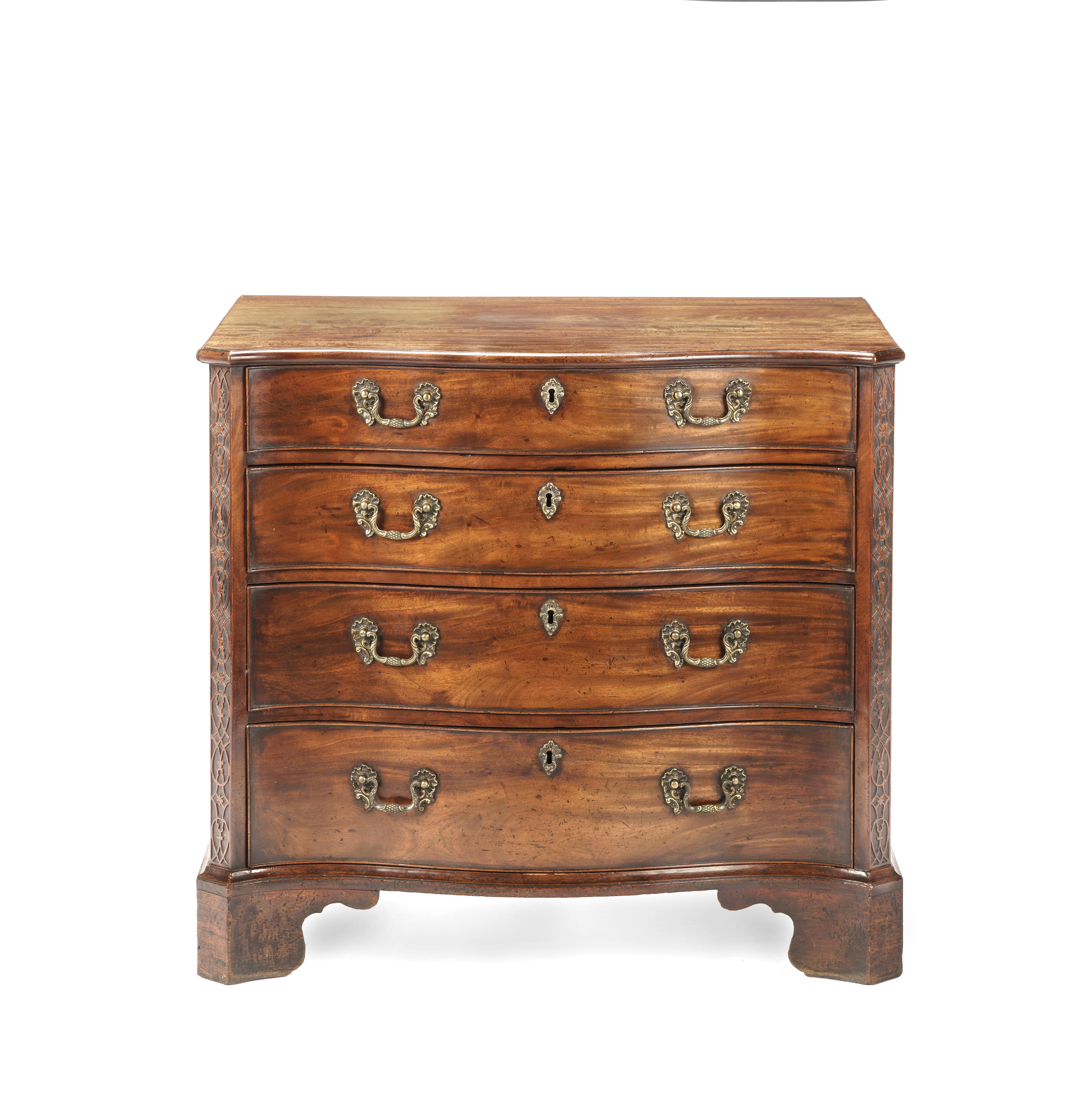 Appraisal: A GEORGE III MAHOGANY SERPENTINE FORM CHEST Of four long