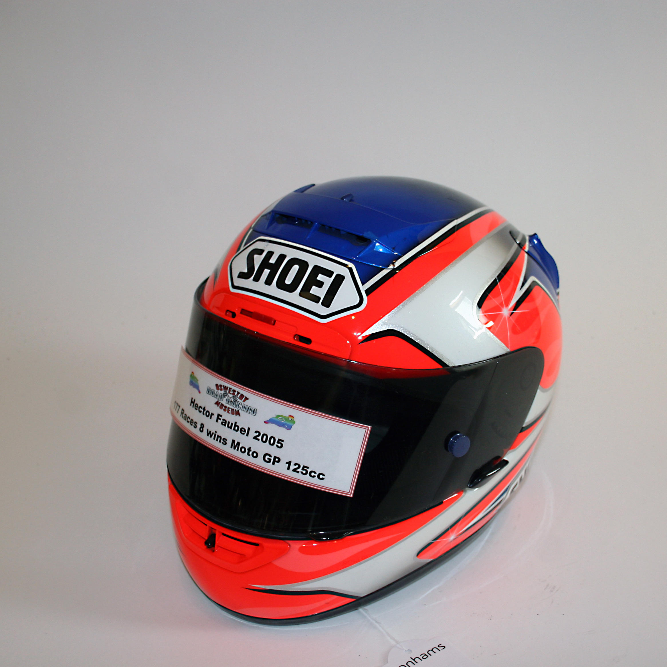 Appraisal: HECTOR FAUBEL A FULL-FACE X-SPIRIT HELMET BY SHOEI used and