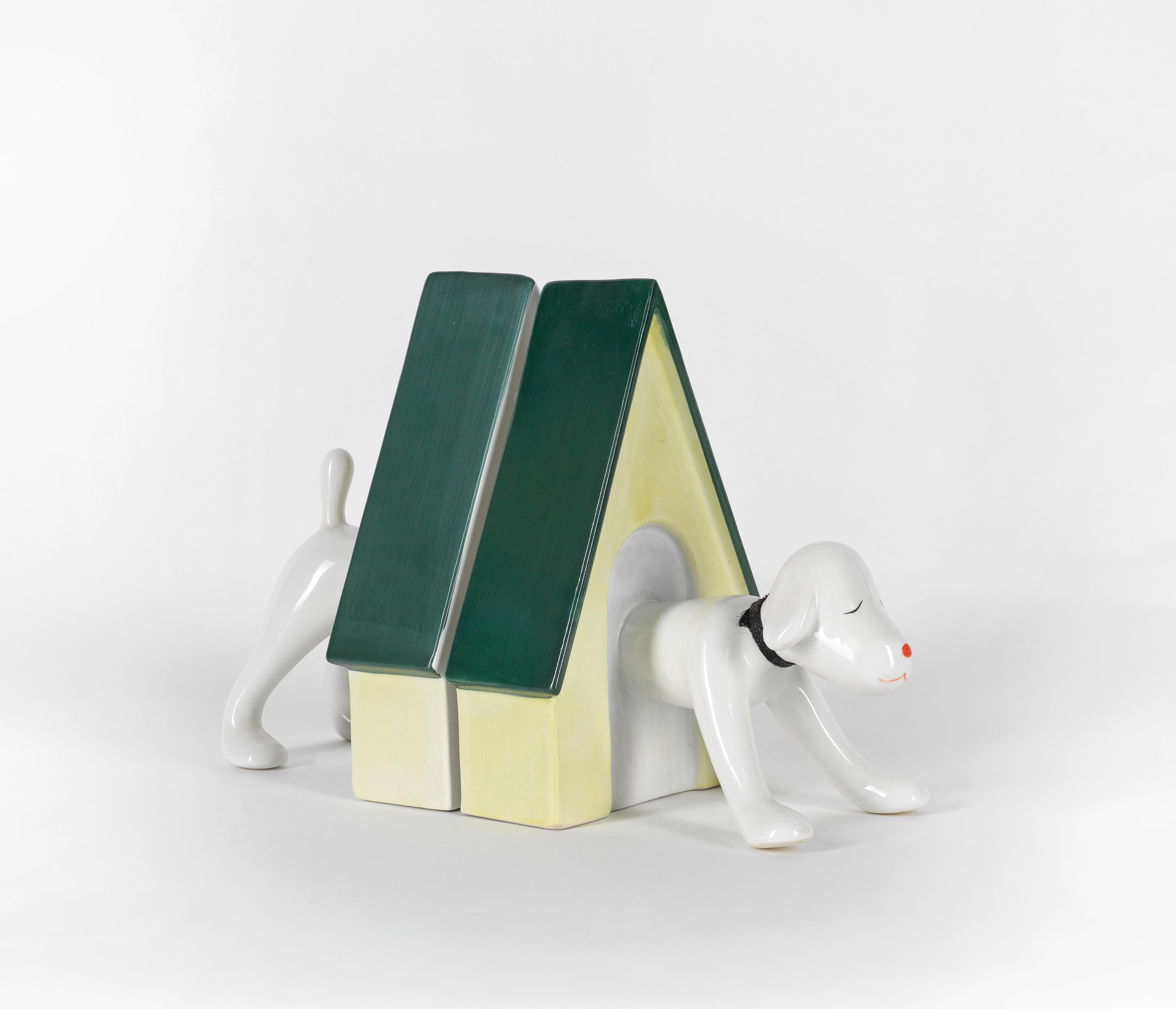 Appraisal: YOSHITOMO NARA JAPANESE BORN Puppy Bookends Painted and glazed ceramic