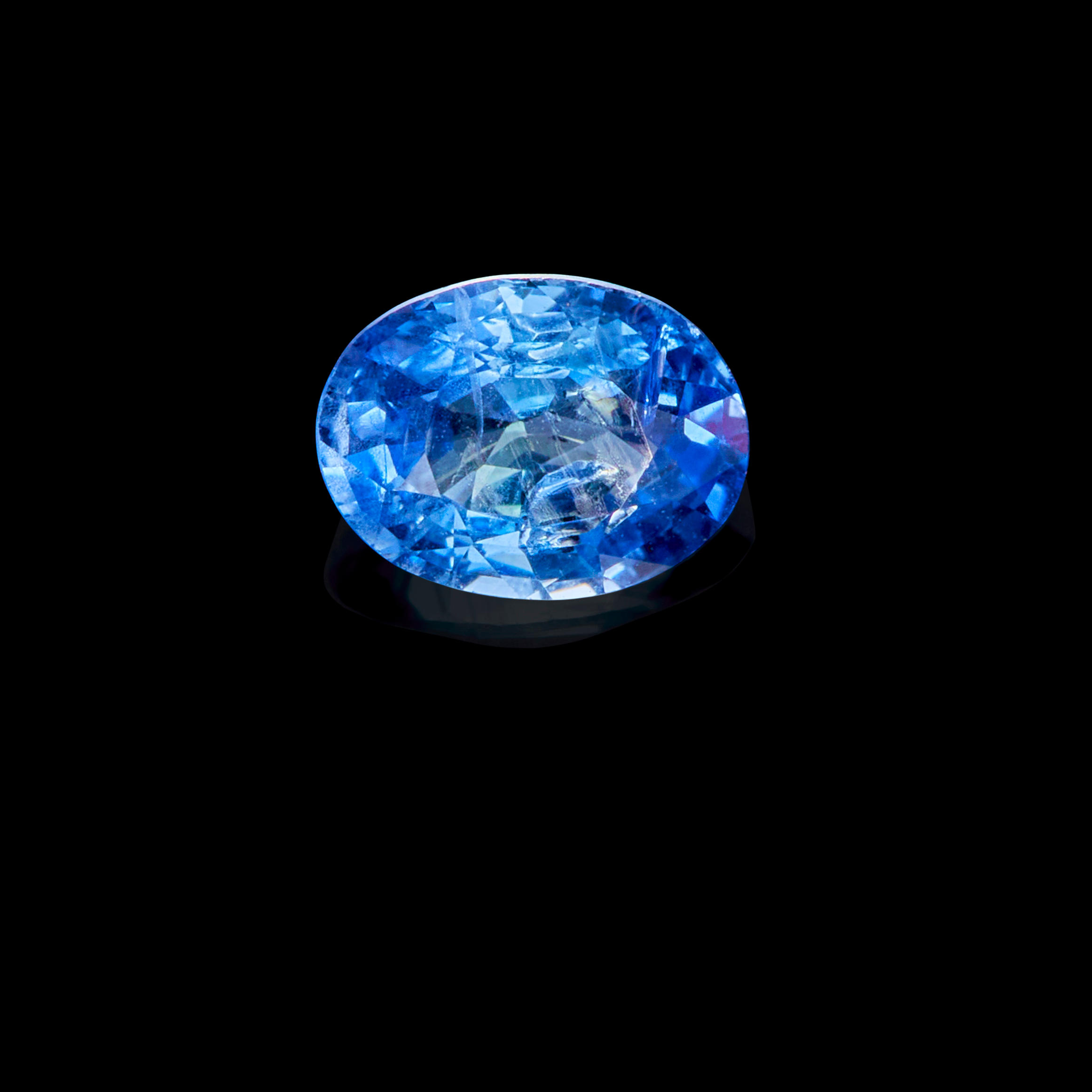 Appraisal: BLUE SAPPHIRE Burma An attractive oval-cut sapphire of pleasing blue