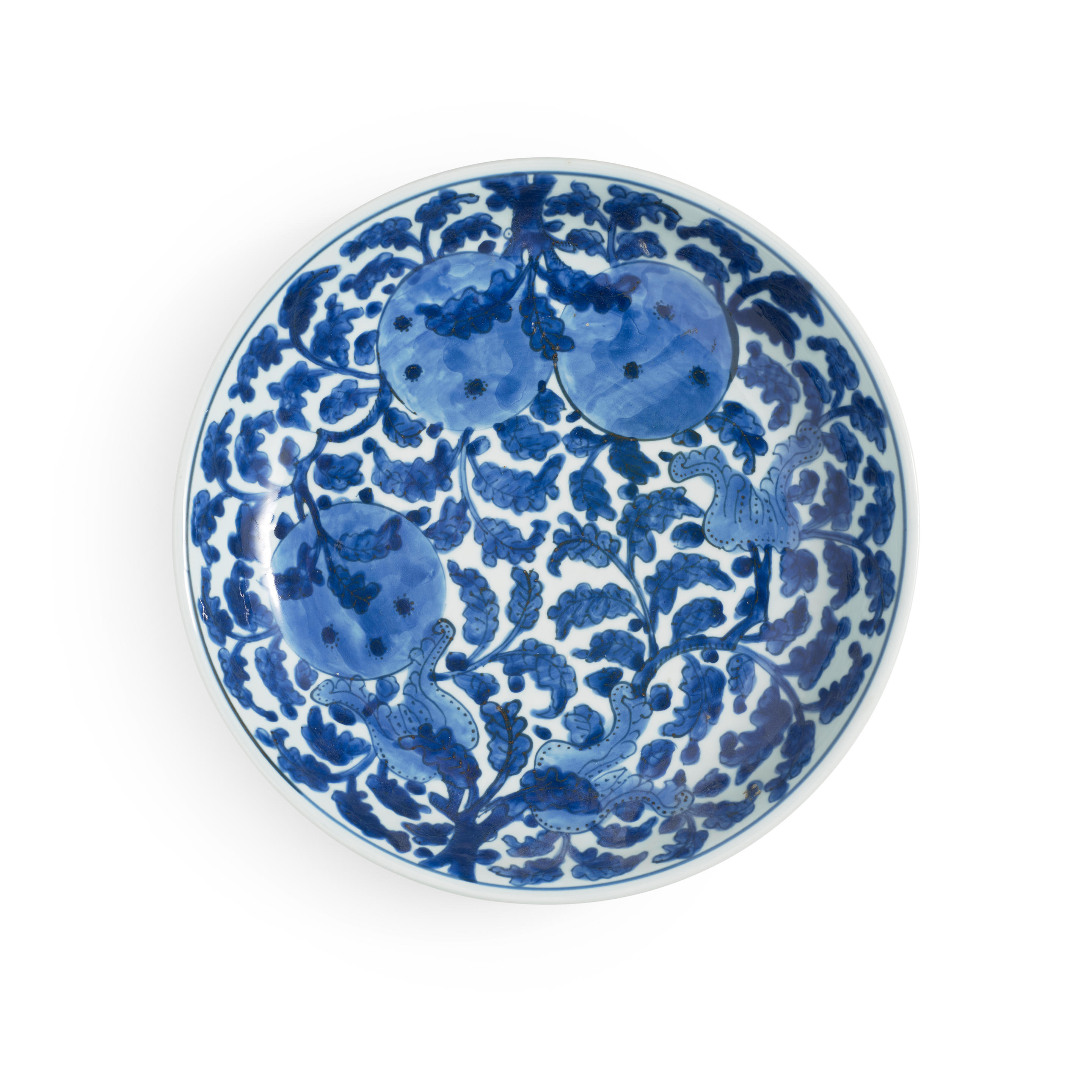 Appraisal: A BLUE AND WHITE 'FRUIT AND FLOWER' DISH Kangxi period