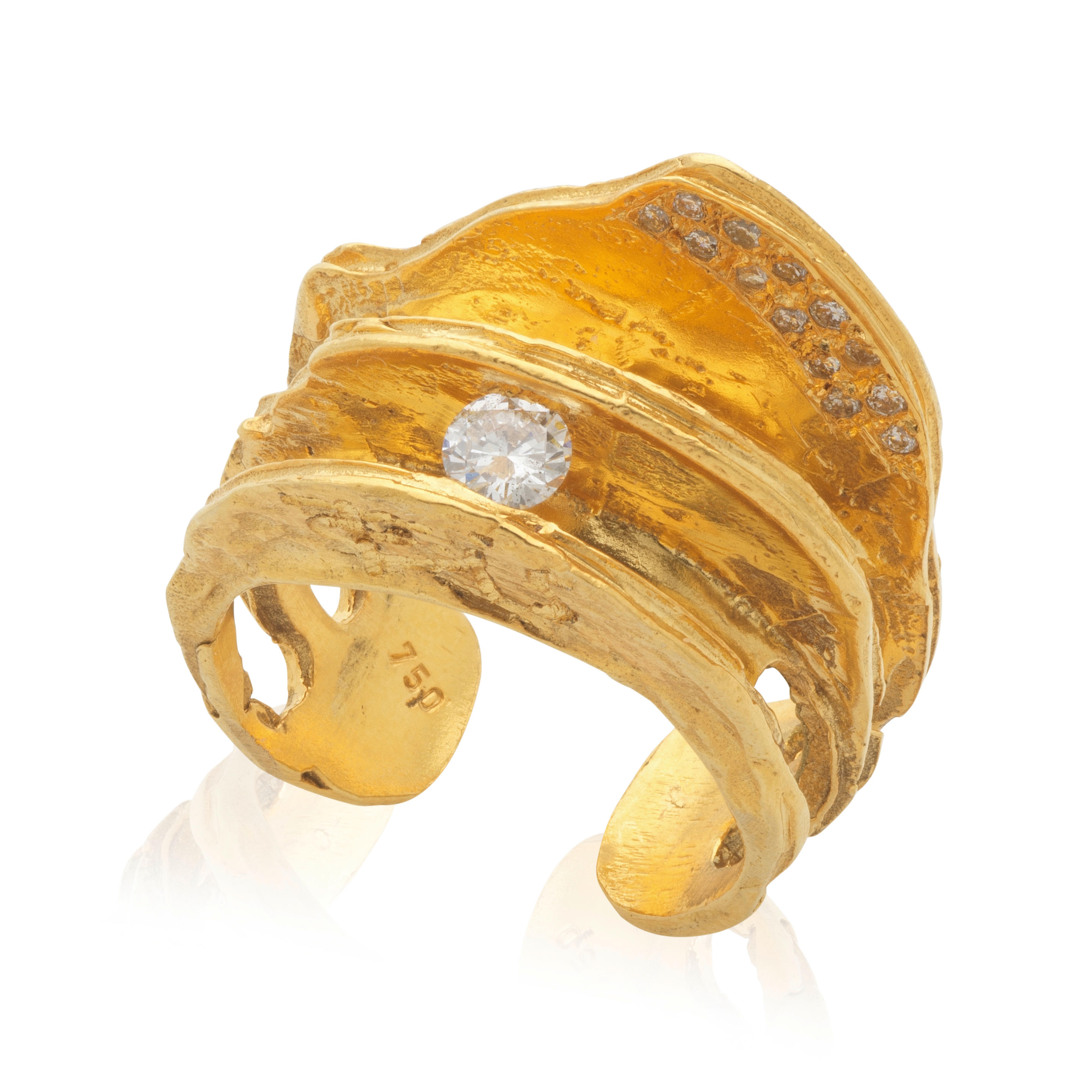 Appraisal: VASSILAKIS TAKIS - BAGUE OR ET DIAMANTS GOLDEN ORBITS DIAMONDS