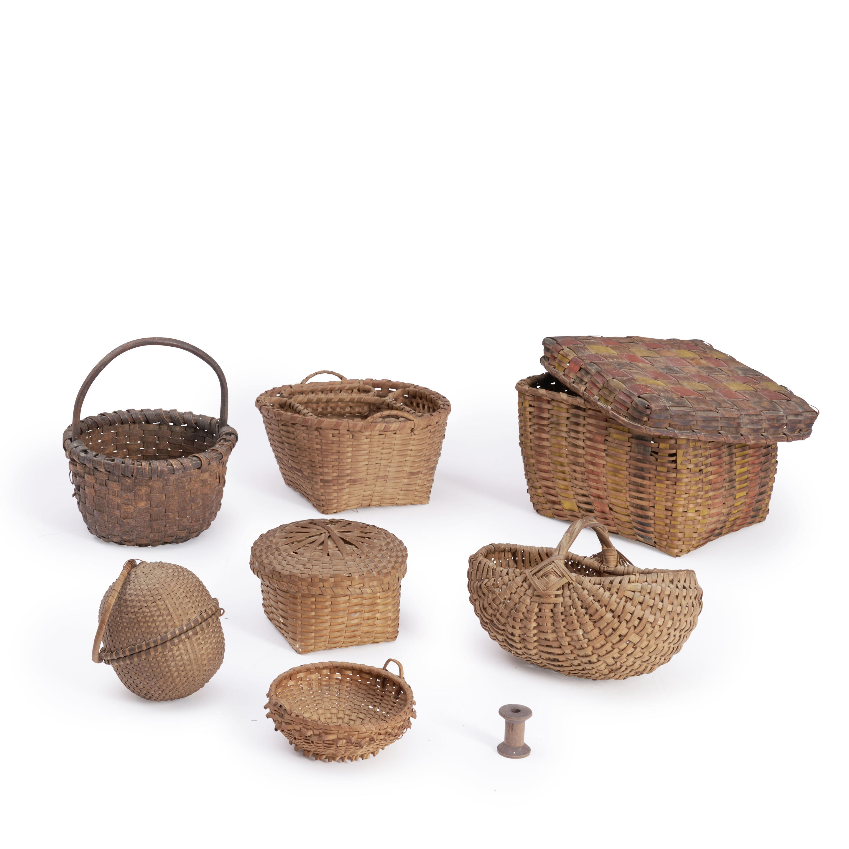 Appraisal: SEVEN WOVEN SPLINT BASKETS America th th century Assembled group