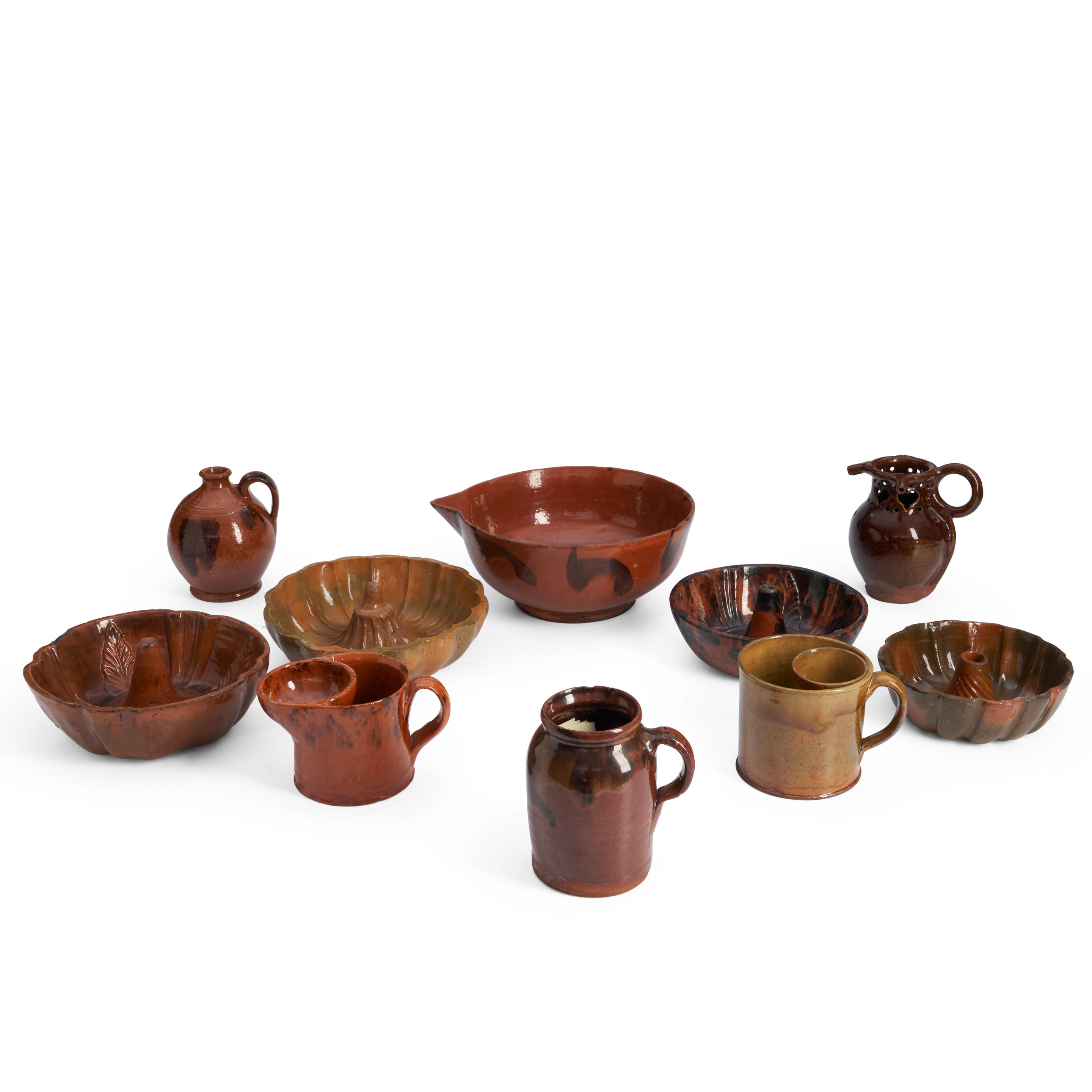 Appraisal: TEN GLAZED REDWARE ITEMS America and Europe th th century