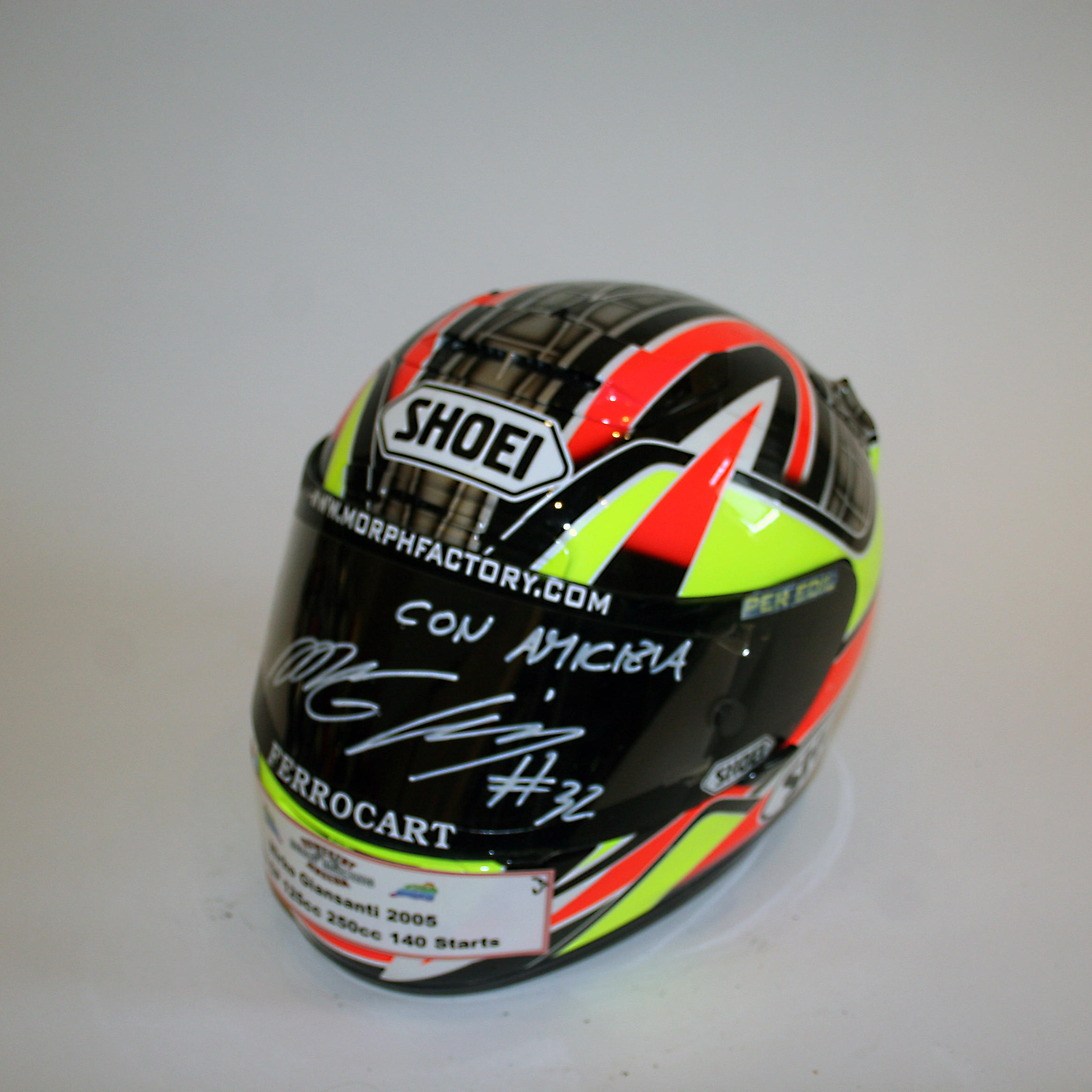 Appraisal: MIRKO GIANSANTI A FULL-FACE HELMET BY SHOEI SIGNED TO THE