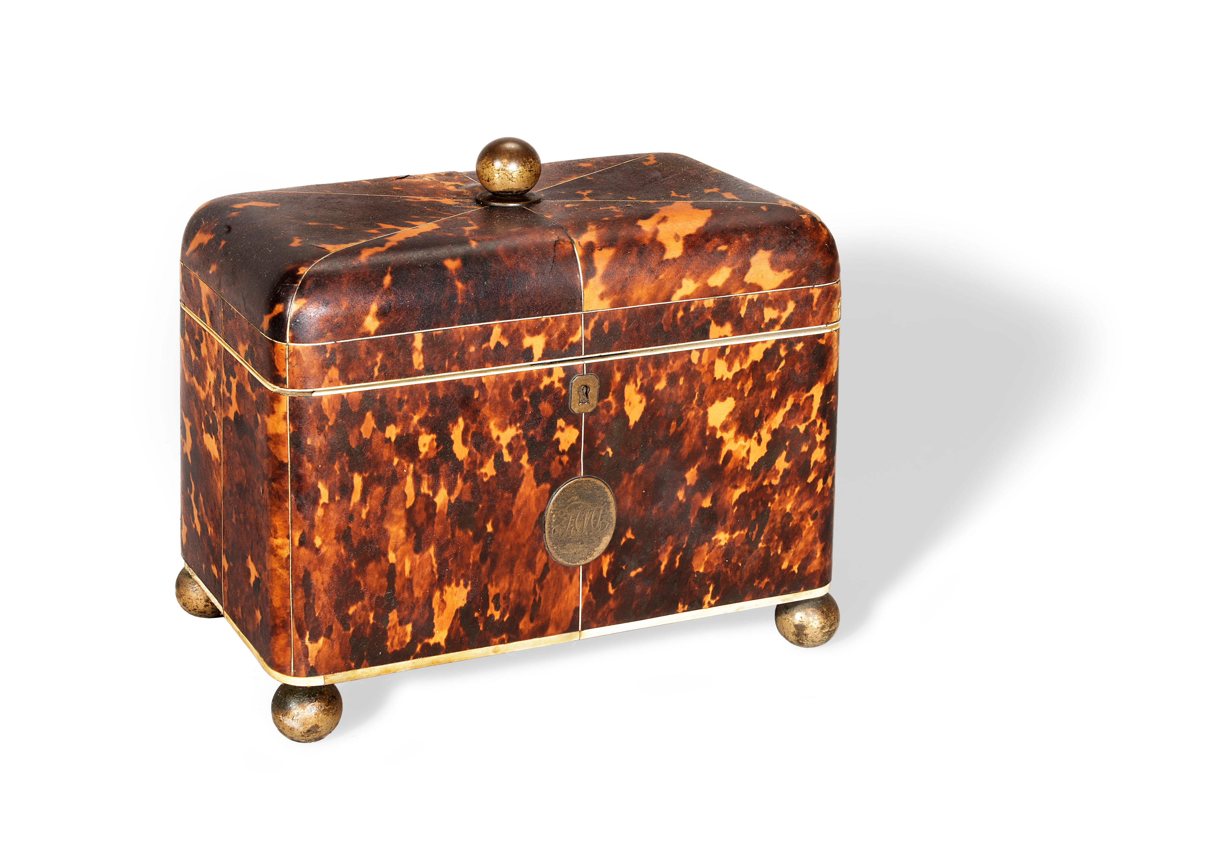 Appraisal: A GEORGE III BLONDE TORTOISESHELL AND IVORY STRUNG TEA CADDY