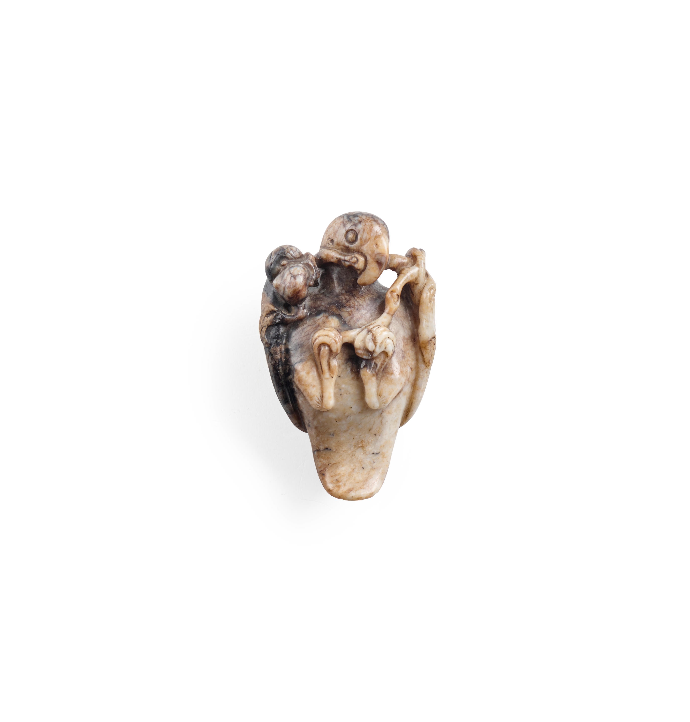 Appraisal: A MOTTLED JADE TOGGLE OF A PARROT th th century